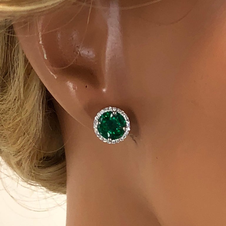 Emerald Cut 1.28 Carat Emerald and 0.22 Carat Diamond Stud Earrings in 18 Karat White Gold For Sale