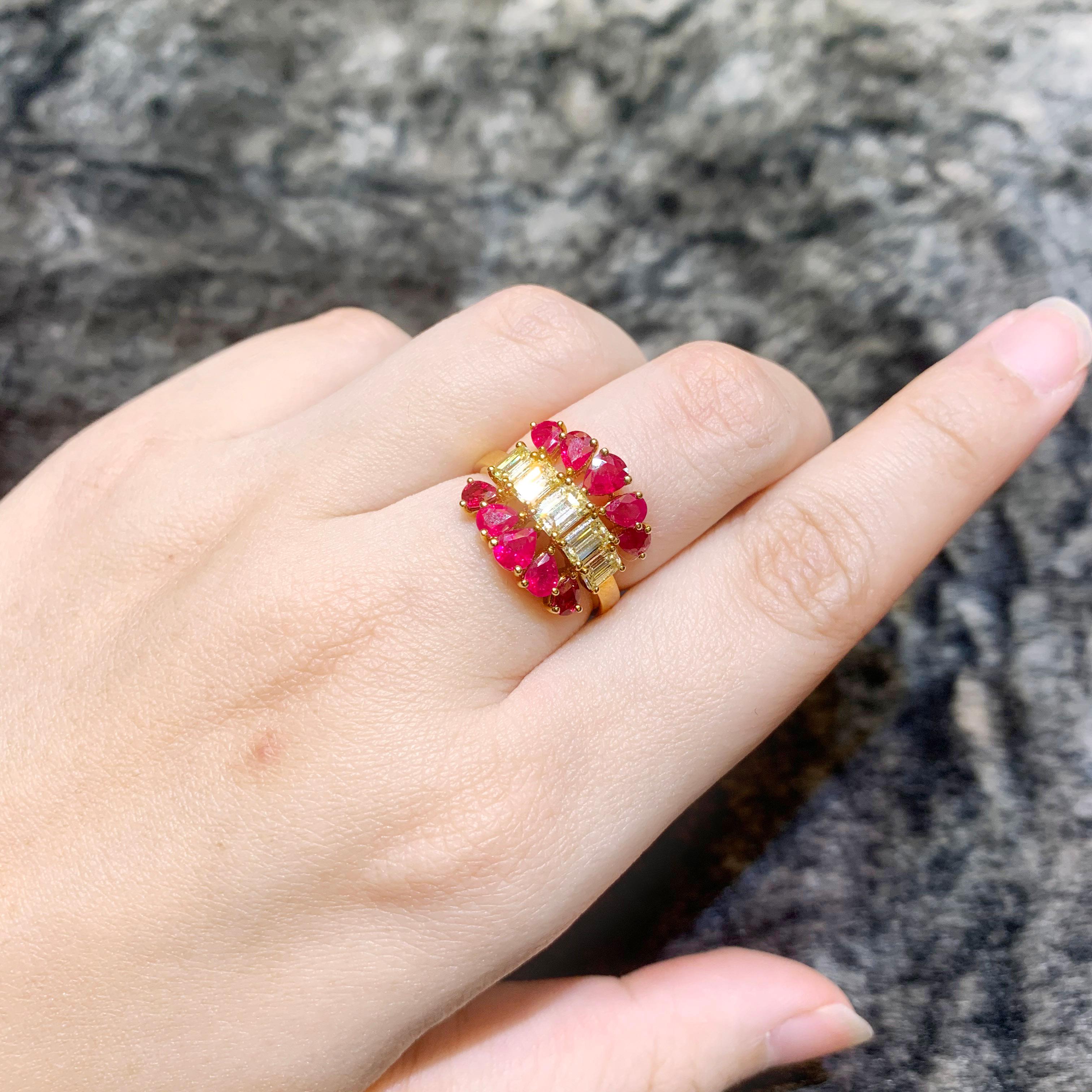 This ring from our Luxuria collection boasts of 1.28 carat of fancy light yellow emerald cut along with 2.02 carat of vivid red Mozambique rubies. The setting is very intricate which gives a 3D feel to the ring.