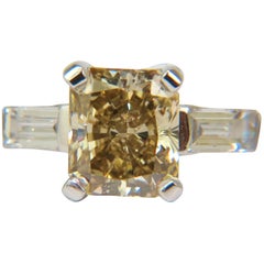 1.28 Carat Fancy Yellow Orange Diamond Ring VS Princess and Platinum