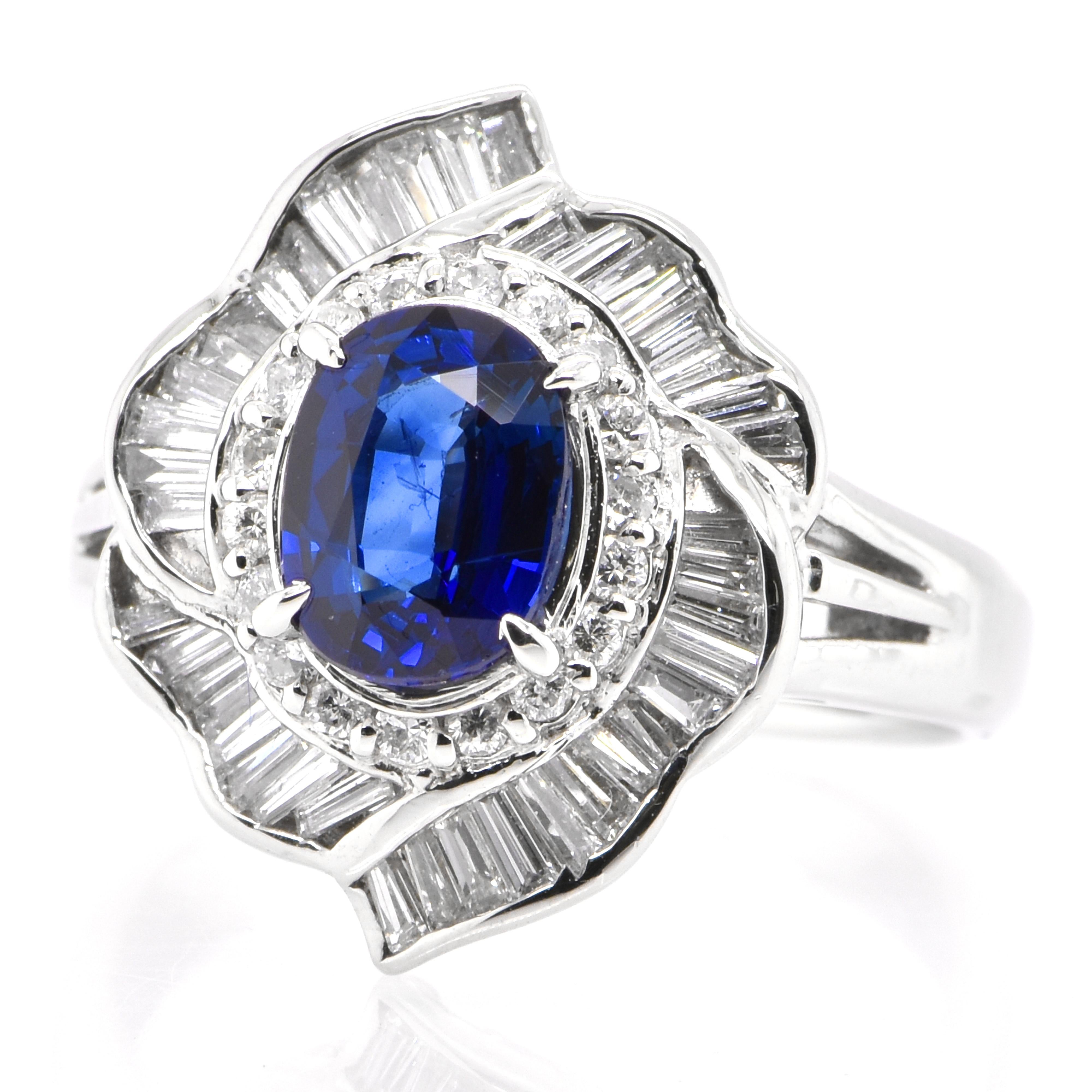 A beautiful ring featuring 1.28 Carat Natural Sapphire and 0.71 Carats Diamond Accents set in Platinum. Sapphires have extraordinary durability - they excel in hardness as well as toughness and durability making them very popular in jewelry.