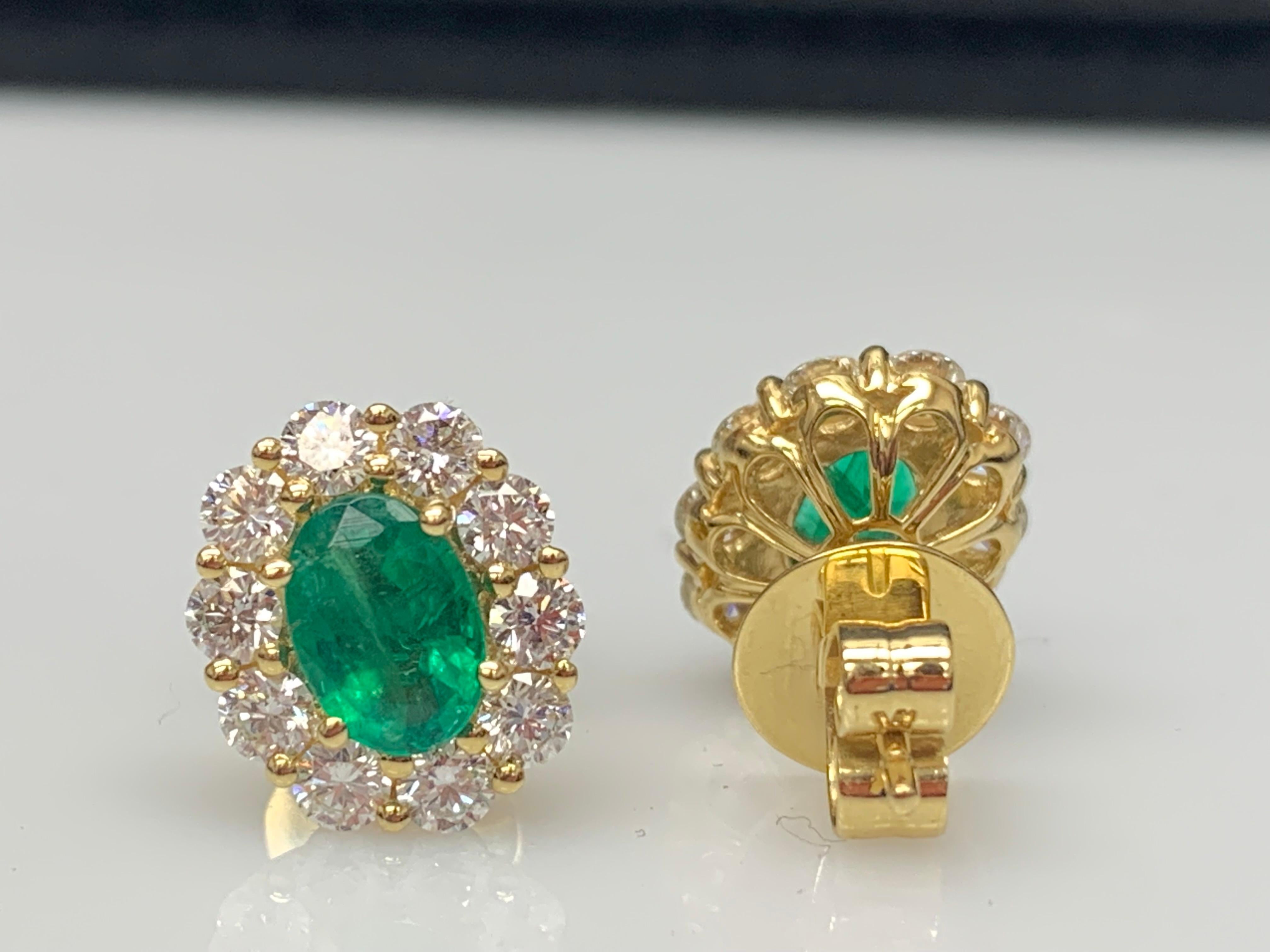 1.28 Carat Oval Cut Emerald and Diamond Stud Earrings in 18K Yellow Gold For Sale 1