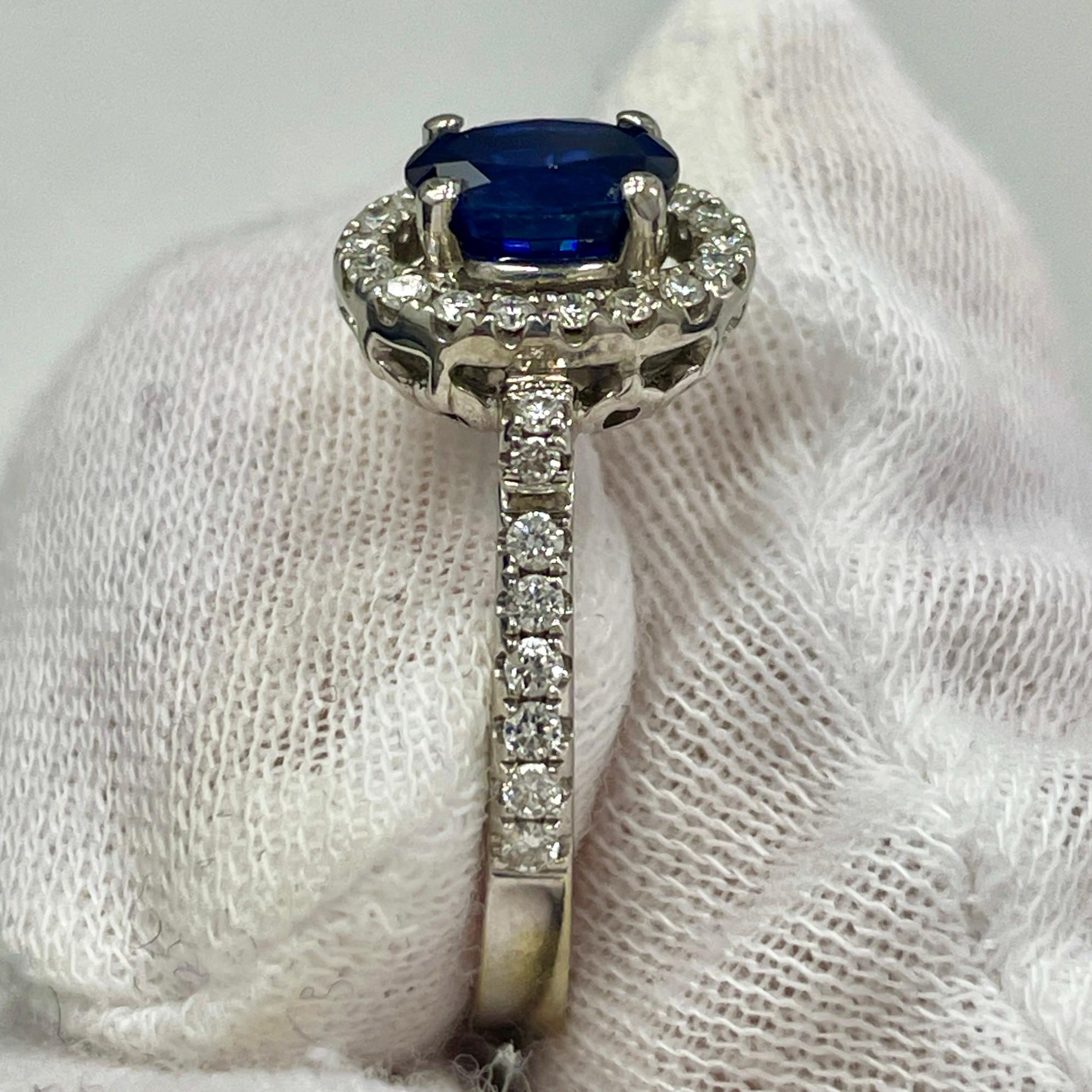 This is a royal blue oval sapphire mounted in an elegant 18K white gold ring with 0.35Ct of brilliant white diamonds. Suitable for any occasion!