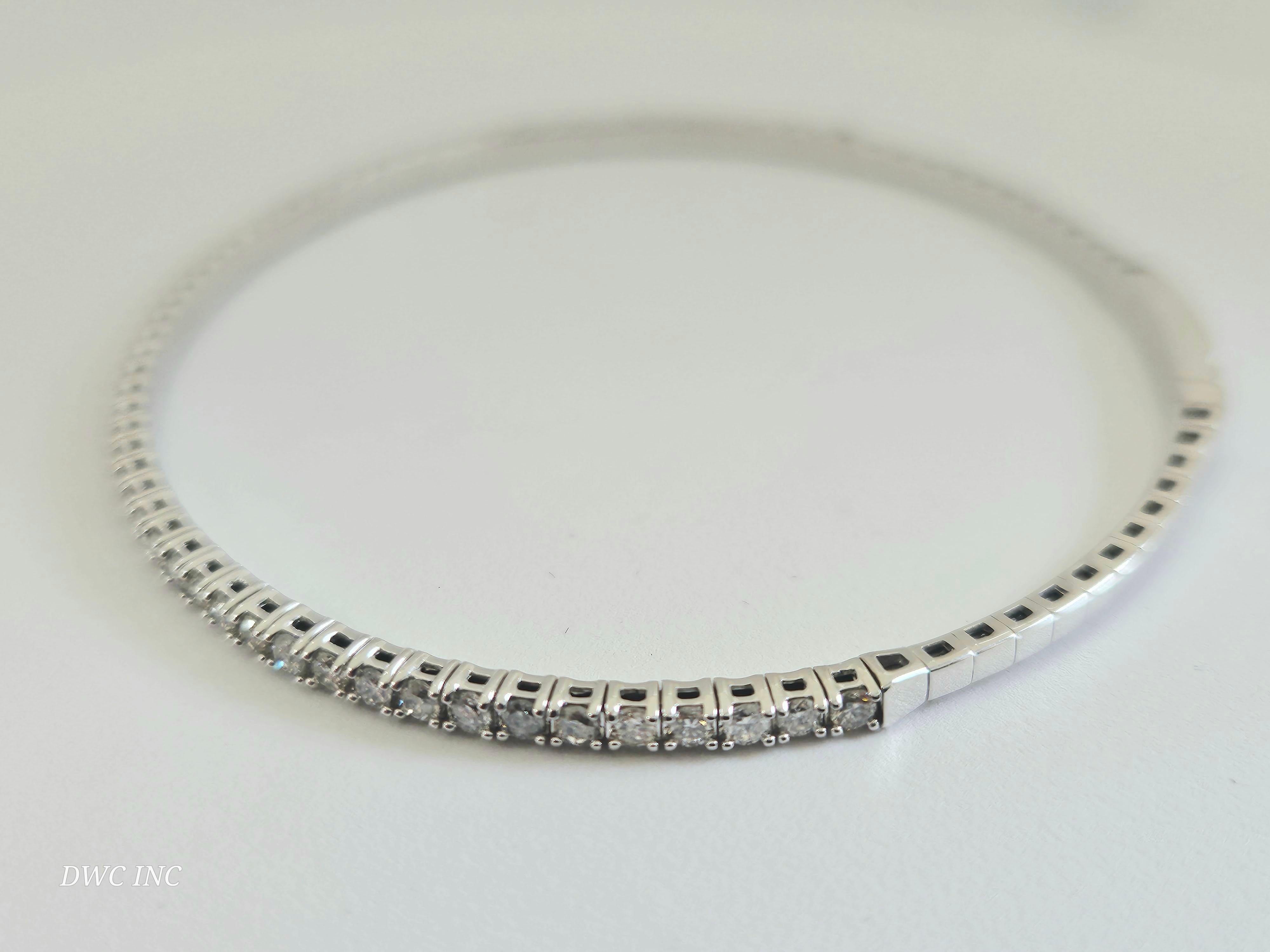 1.28 Carat Diamants naturels Mini Bangle bracelet coupe ronde-brillante  Or blanc 14k. 
7 pouces. 55pcs Moyenne H-,I  2,3 mm de large. Très brillant 6.08 grammes.