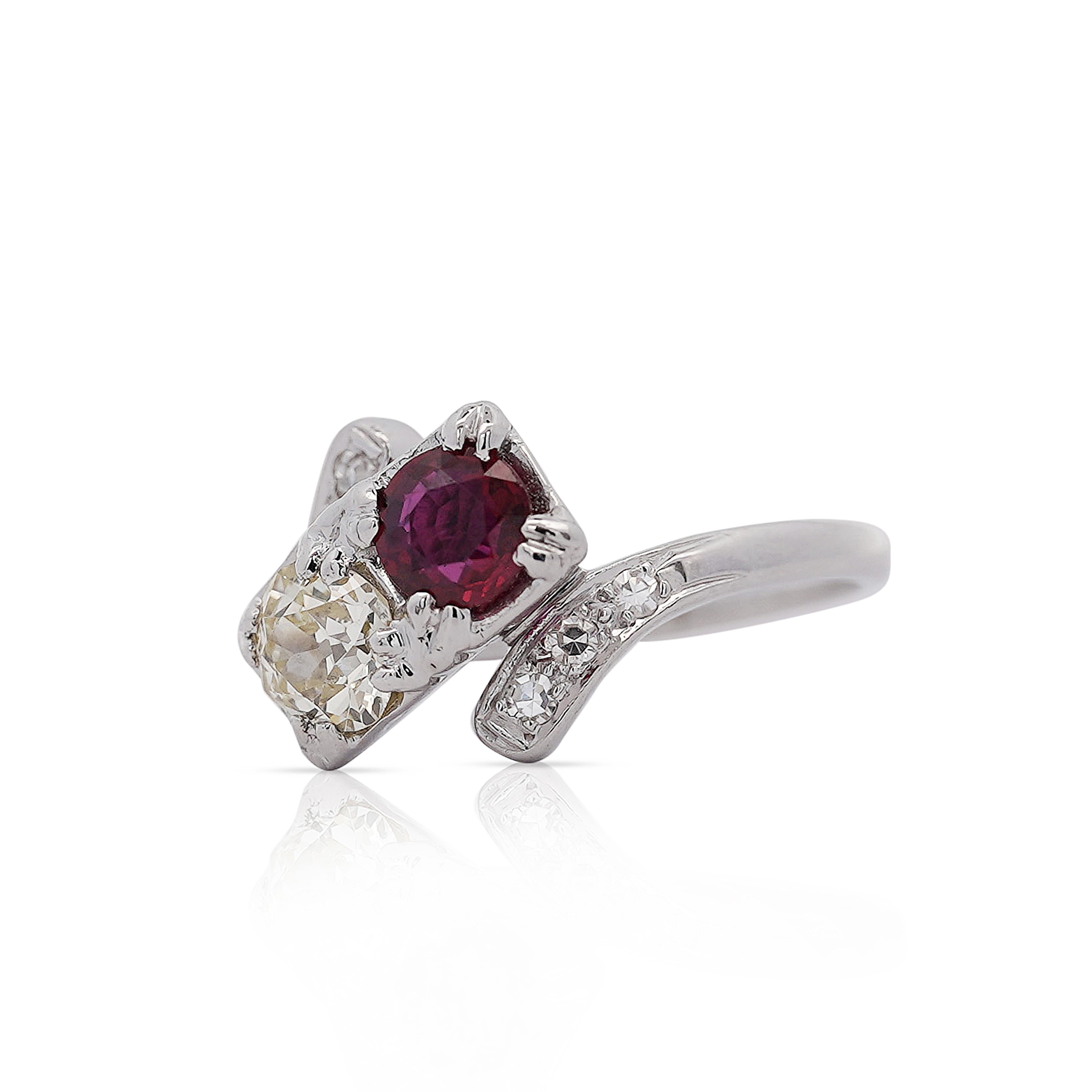 Vintage 1.28 Carat Ruby & Diamond 14K White Gold Toi Et Moi Ring, Size 6.75 (adjustable).

Details:
Item Type: Toi Et Moi Ring
Metal: 14K White Gold
Size: 6.75 (adjustable)
Weight: 4.14 Grams
 
Center Ruby Details:
Carat: 0.68 Carat
Color: Red
Cut: