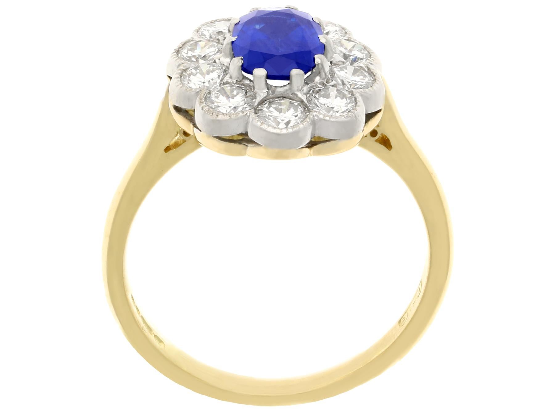 Oval Cut Vintage 1.28 Carat Sapphire and 1.30 Carat Diamond Yellow Gold Cluster Ring For Sale