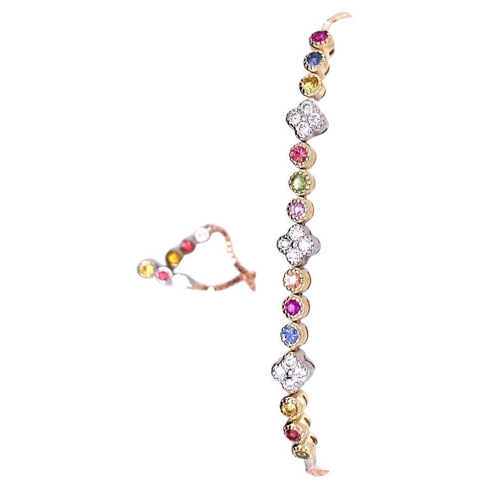 Dainty, Delicate, and Beautiful. 
A 14K Tri Color Gold Multi Color Sapphire and Diamond Bracelet with an adjustable strap. 

There are 16 Multi Colored Round Cut Sapphires that weigh 0.96 carats and 14 Round Cut Diamonds that weigh 0.32 carats, with