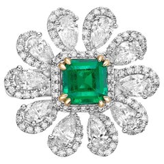 Used 1.28 Carat Sunflower Emerald Bridal Ring in 18KWYG with White Diamond.