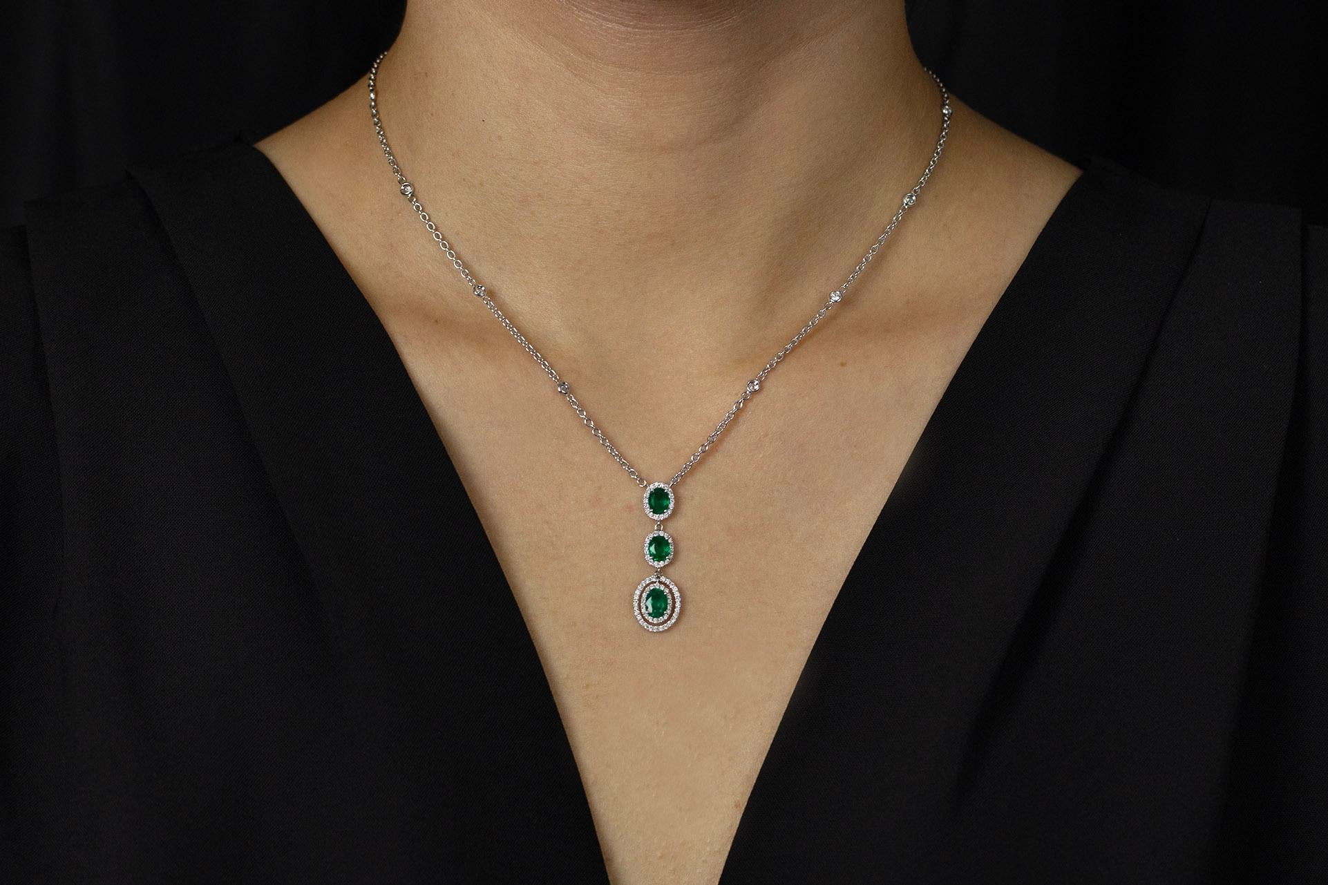 Contemporary Roman Malakov 1.28 Carat Oval Cut Emerald with Diamond Halo Pendant Necklace  For Sale