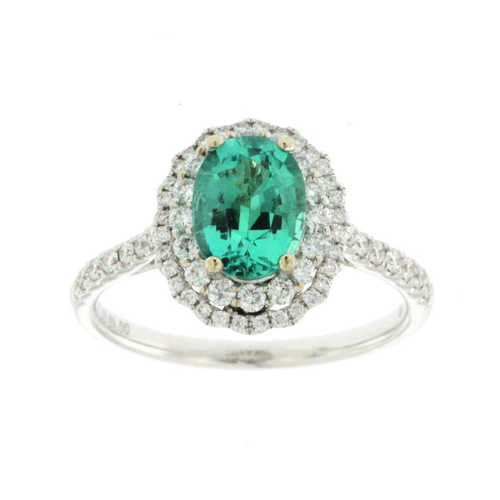 
Top: 13.6 mm
Band Width: 1.5 mm
Metal: 18K White Gold 
Size: 6-8 ( Please message Us for your Size )
Hallmarks: 750
Total Weight: 4.4 Grams
Stone Type: 2.14 CT Natural Emerald & 0.89 G VS2 CT Diamonds
Condition: New
Estimated Retail Price: