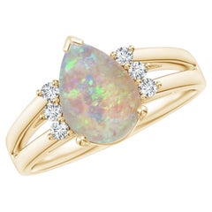 Anillo de ópalo pera de 1,28 CTW con tres diamantes como adorno, en oro macizo de 14K