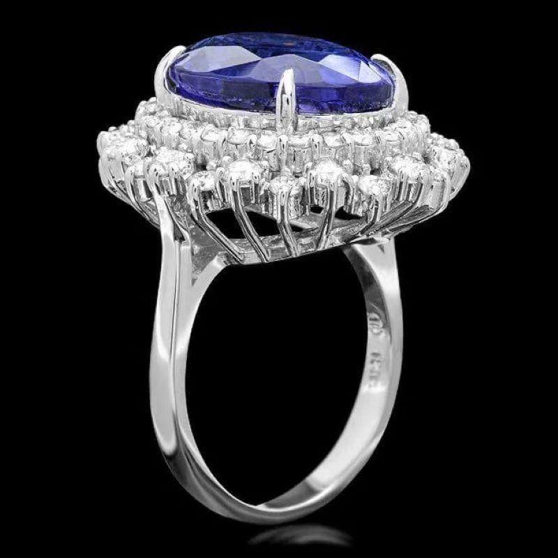 12.80 Carats Natural Tanzanite and Diamond 18K Solid White Gold Ring

Total Natural Tanzanite Weight is: Approx. 10.90 Carats 

Tanzanite Measures: Approx. 15.00 x11.00mm

Natural Round Diamonds Weight: Approx. 1.90 Carats (color G-H / Clarity
