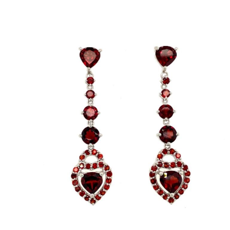 12.86 Carat Garnet Long Dangle and Drop Earrings in sterling silver to make a statement with your look. You shall need drop earrings to make a statement with your look. These earrings create a sparkling, luxurious look featuring heart, round cut