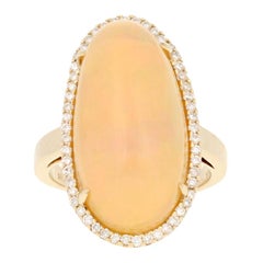 12.87 Carat Cabochon Cut Ethiopian Opal and Diamond Ring, 14k Yellow Gold Halo