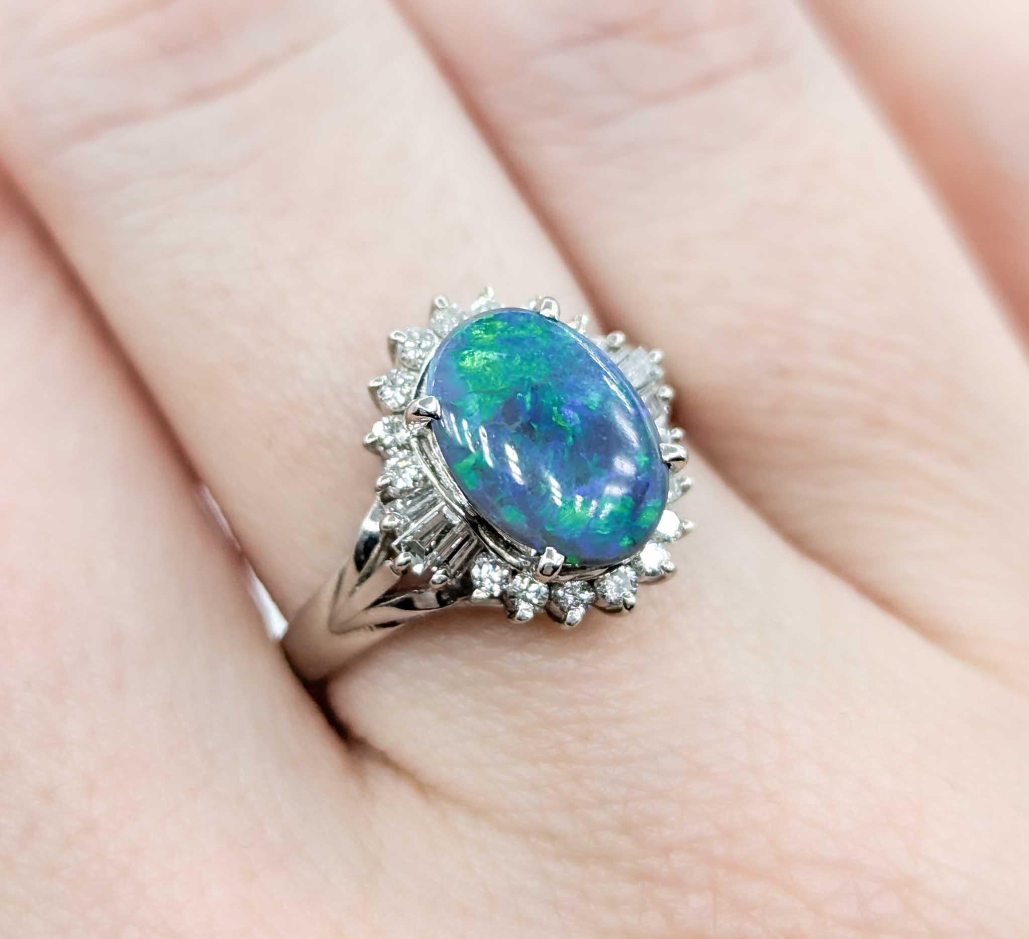 Cabochon 1.28ct Black Opal with Diamond Halo in Platinum