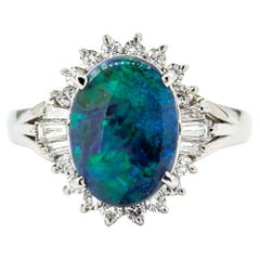 1.28ct Black Opal with Diamond Halo in Platinum