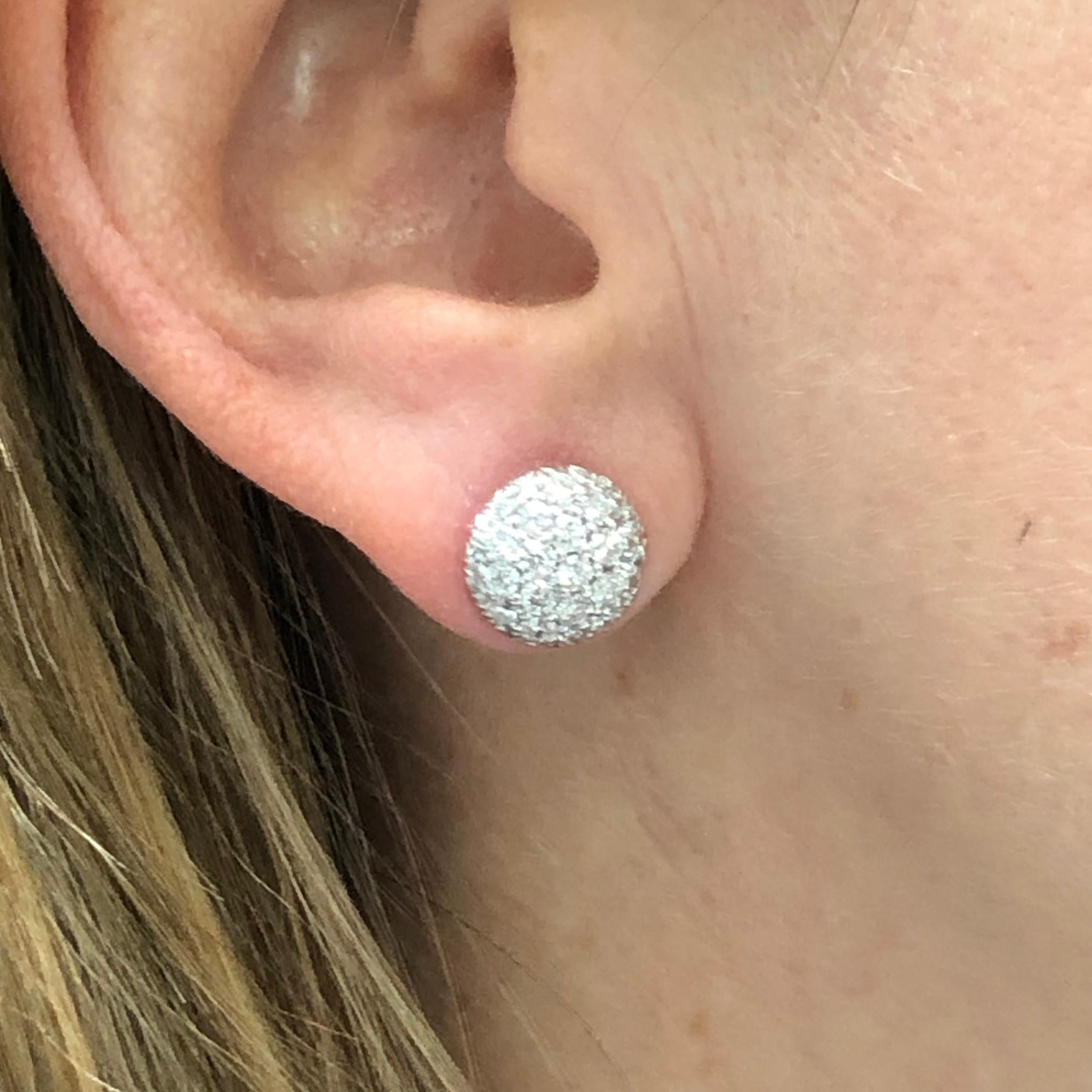 9.8 millimeter micro-pave cluster earrings with 62 diamonds G color nice SI clarity 1.28ct total weight with screw backs. If you don't see something, say something! We are a custom jewelry manufacturer in the heart of the Diamond District in New