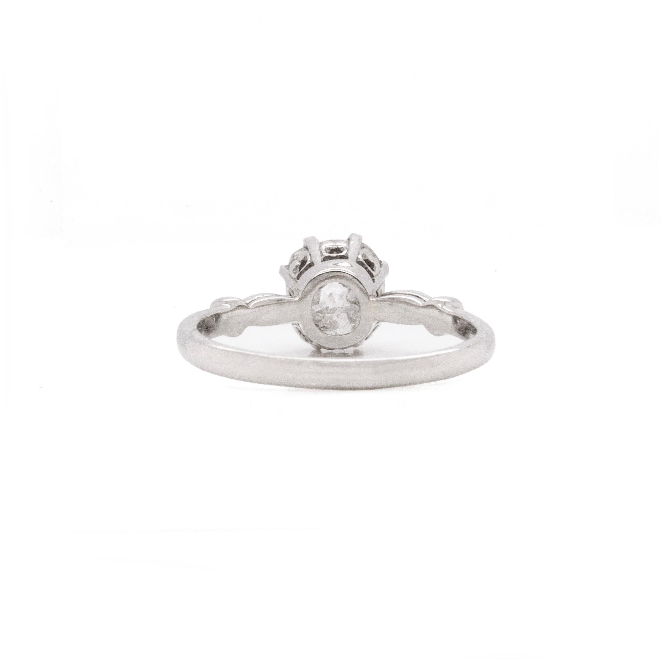 It's hard not to fall in love with this beautiful ring, with its distinctive design that perfectly brings together an old cut diamond with a more modern, vintage-style ring.

A gorgeous original 1.28ct old mine cut diamond takes centre stage, and is
