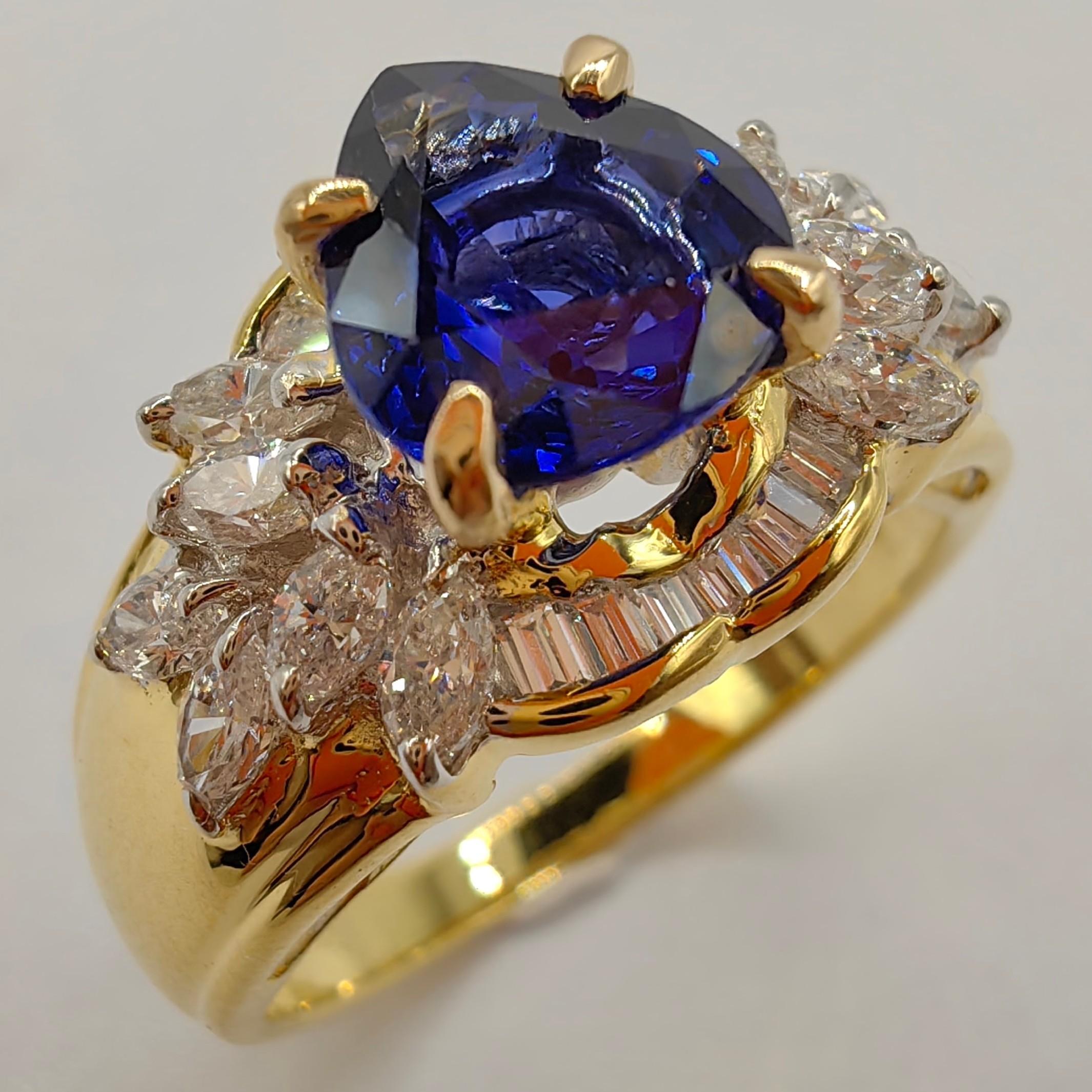 1,28 Karat Birnenschliff Königsblauer unerhitzter Saphir Cluster Diamantring aus 18 Karat Gold (Zeitgenössisch)