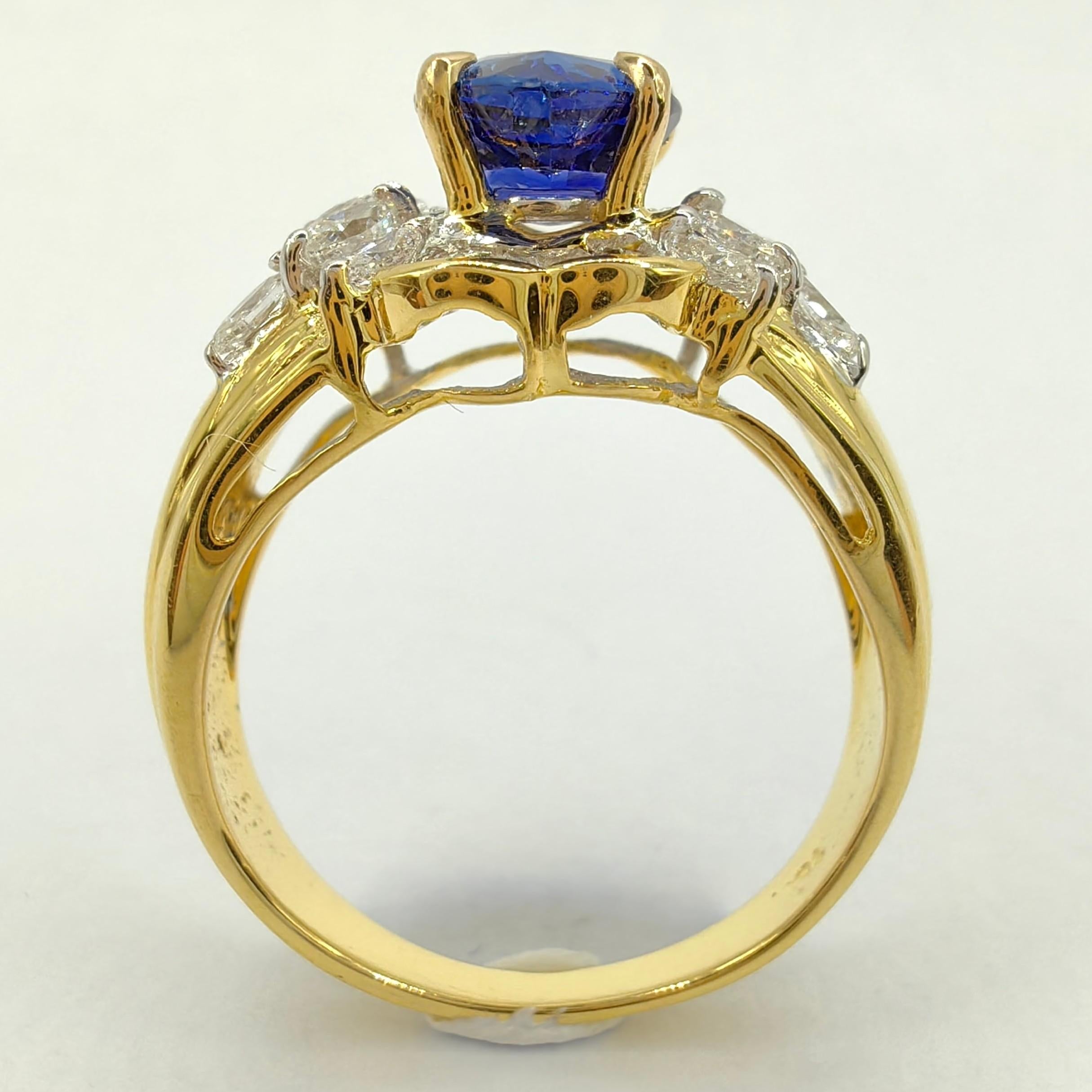 1,28 Karat Birnenschliff Königsblauer unerhitzter Saphir Cluster Diamantring aus 18 Karat Gold Damen