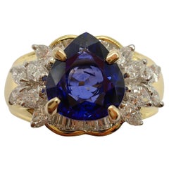 1.28ct Pear-Cut Royal Blue Unheated Sapphire Cluster Diamond Ring in 18k Gold