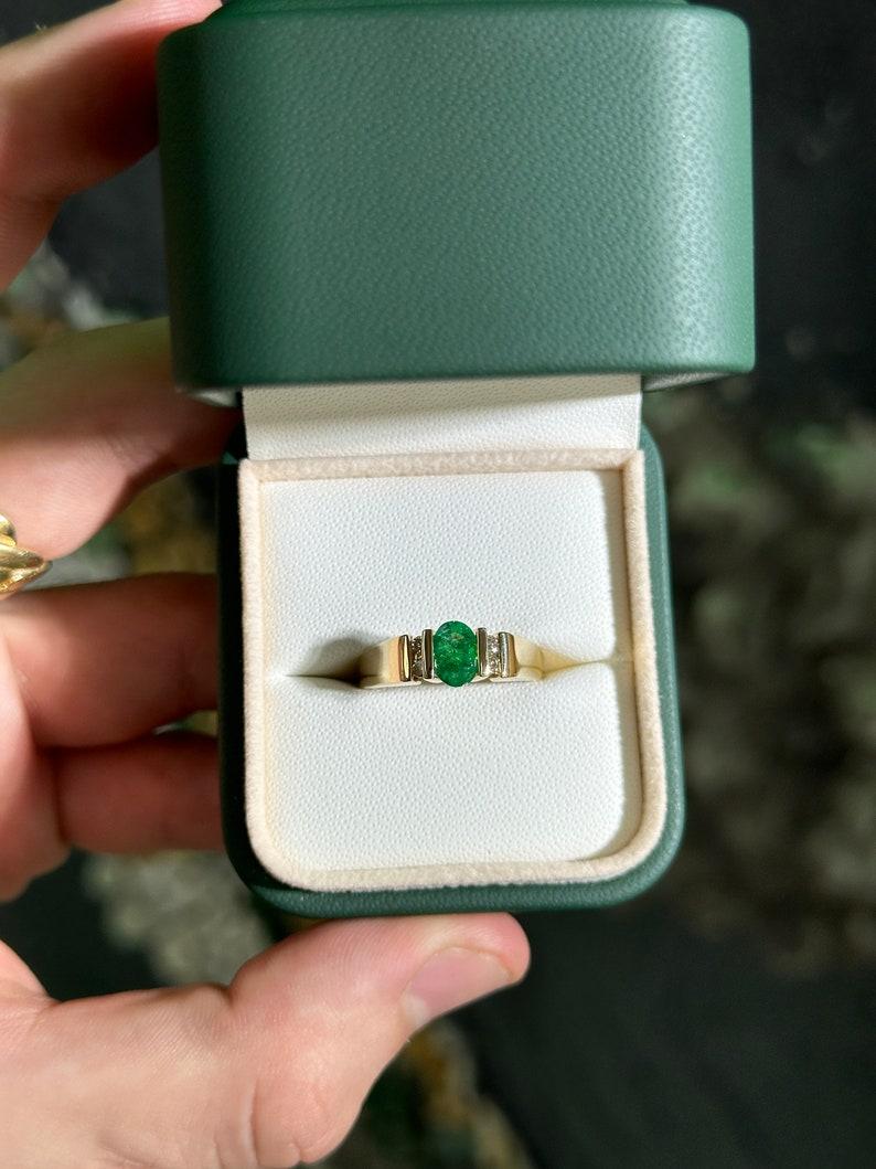 1.28tcw 14K Oval Emerald & Diamond Ring - Rich Green Tension Set Five-Stone 585 In New Condition For Sale In Jupiter, FL