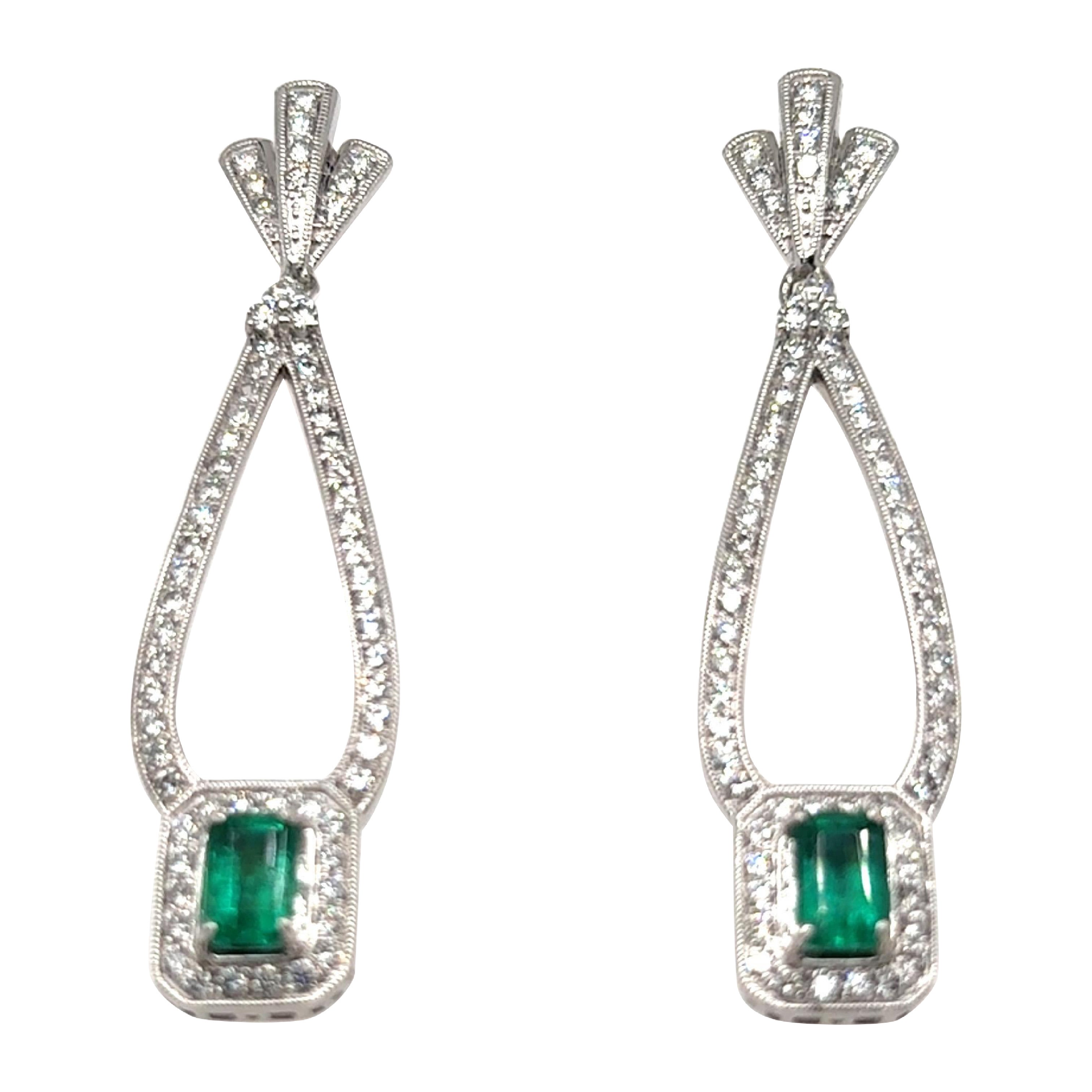 Boucles d
oreilles pendantes en diamant taille émeraude de 1,29 carat