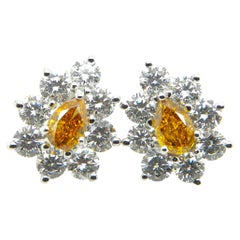 1.29 Carat GIA Certified Fancy Deep Yellow-Orange Diamond and Diamond Earrings