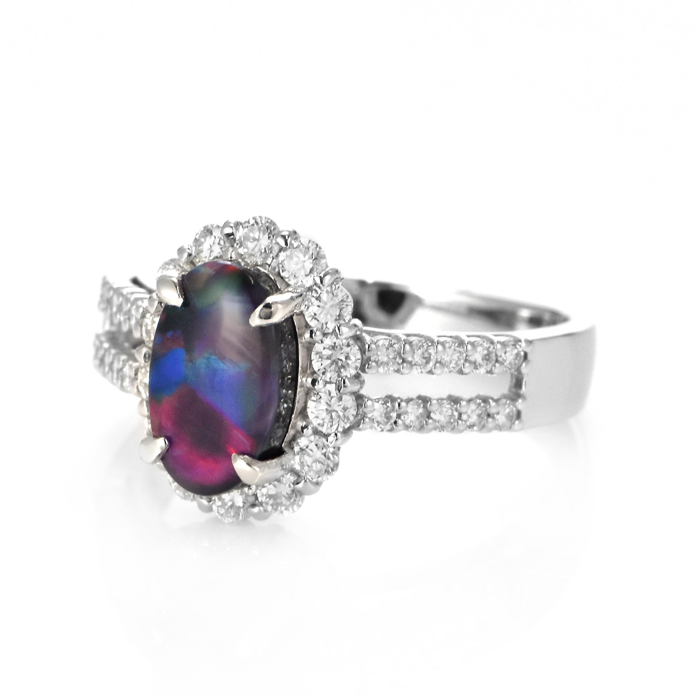 Modern 1.29 Carat Natural Lightning Ridge Black Opal and Diamond Ring Made in Platinum For Sale