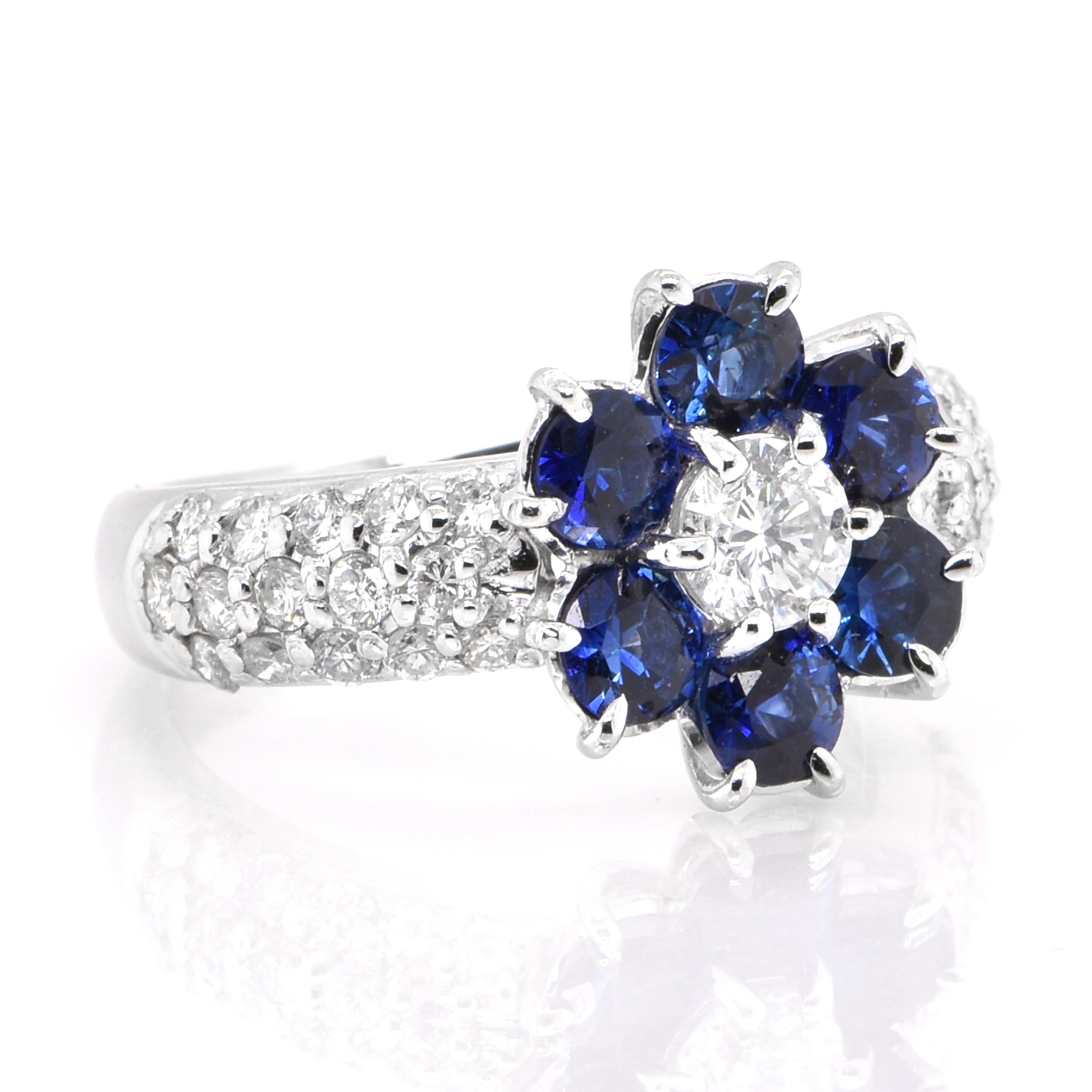 Modern 1.29 Carat Natural Sapphire and Diamond Cluster Ring Set in Platinum For Sale