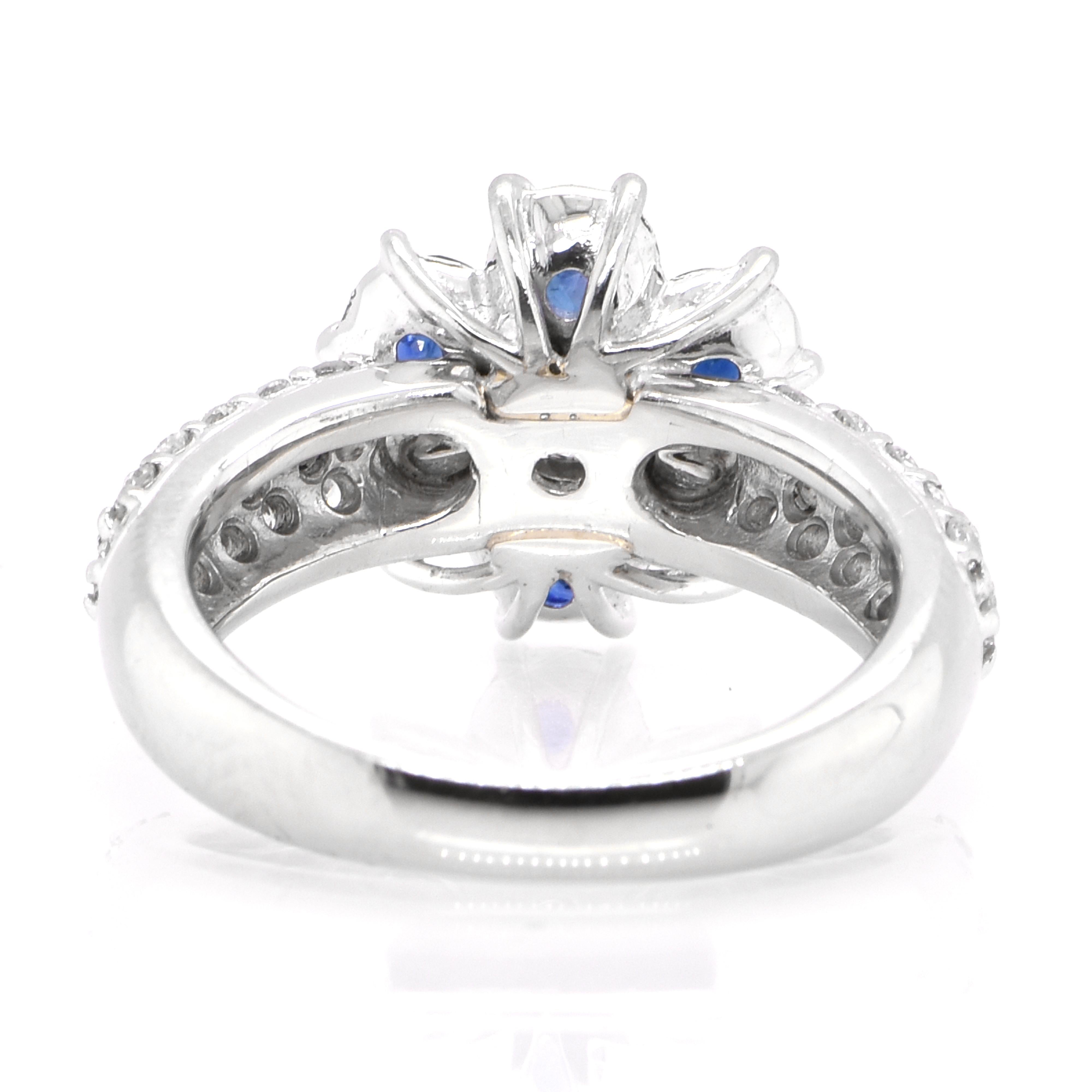 Women's 1.29 Carat Natural Sapphire and Diamond Cluster Ring Set in Platinum For Sale