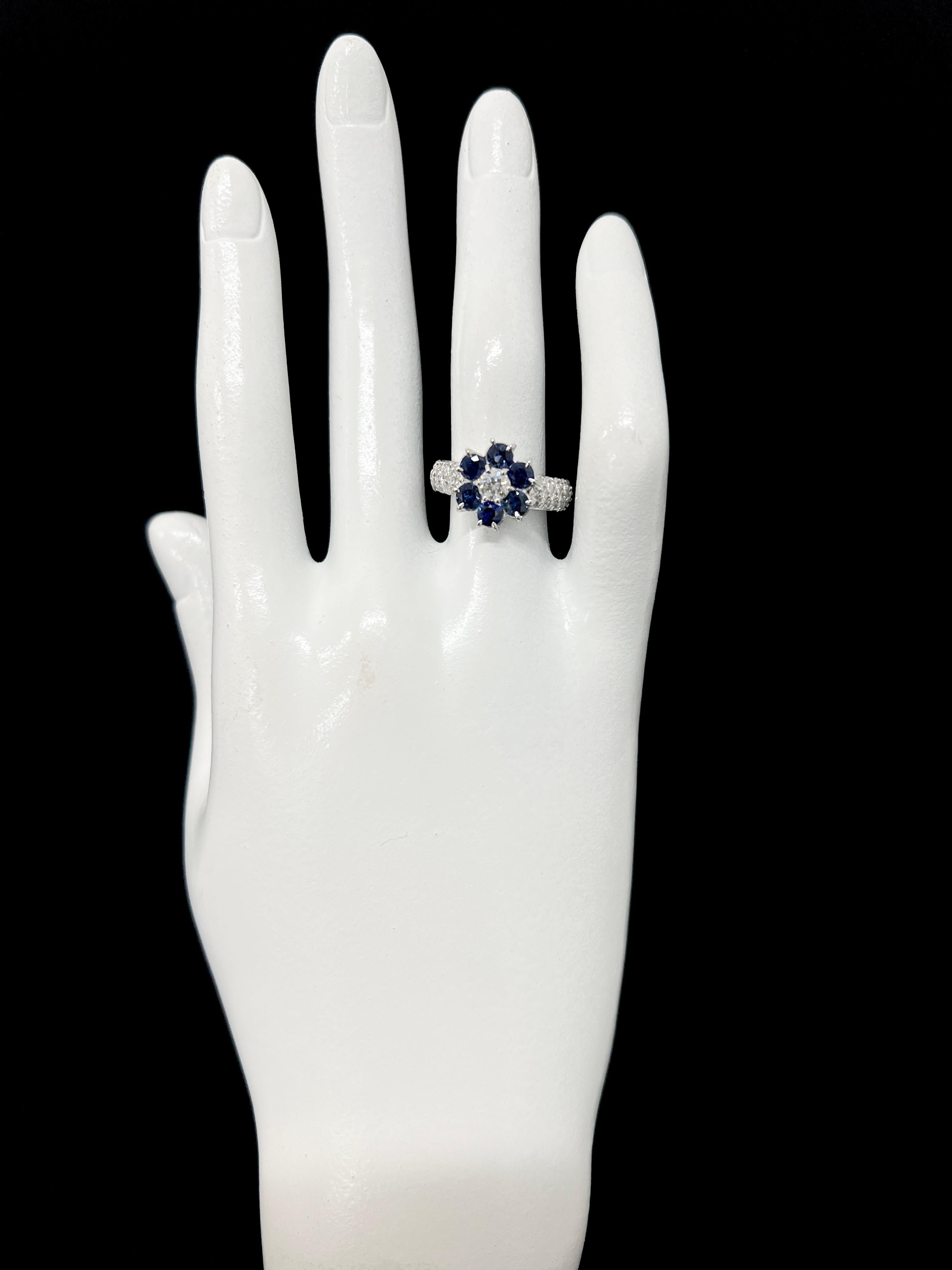 1.29 Carat Natural Sapphire and Diamond Cluster Ring Set in Platinum For Sale 1