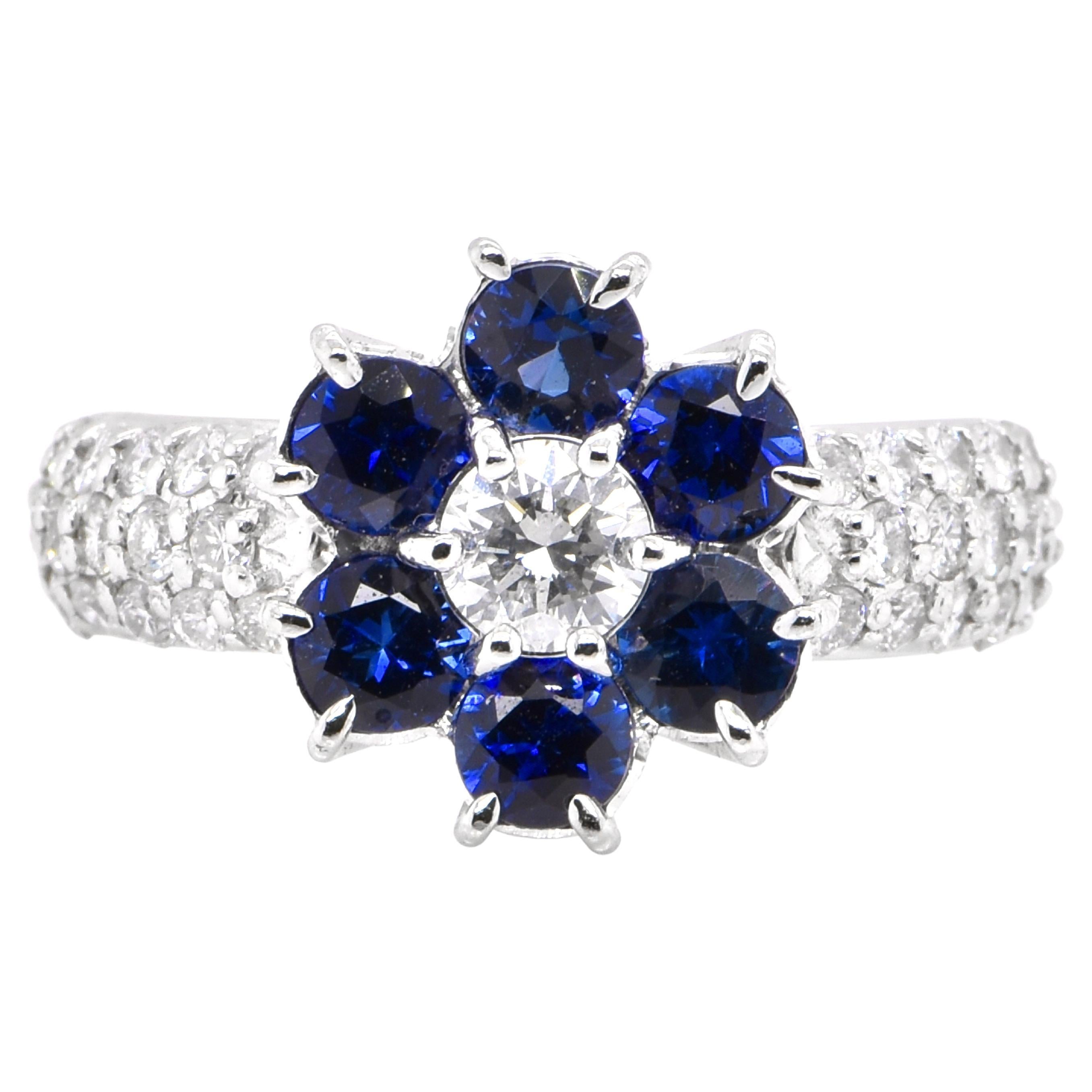 1.29 Carat Natural Sapphire and Diamond Cluster Ring Set in Platinum For Sale