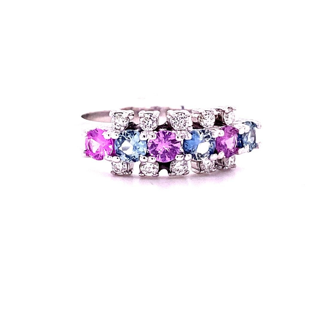 1.29 Carat Natural Sapphire and Diamond White Gold Band

There are 6 Multi Colored Sapphires that weigh 1.03 carats and 10 Round Cut Diamonds that weigh 0.26 Carats (Clarity: SI1, Color: F)  The total carat weight is 1.29 carats. 
Crafted in 14
