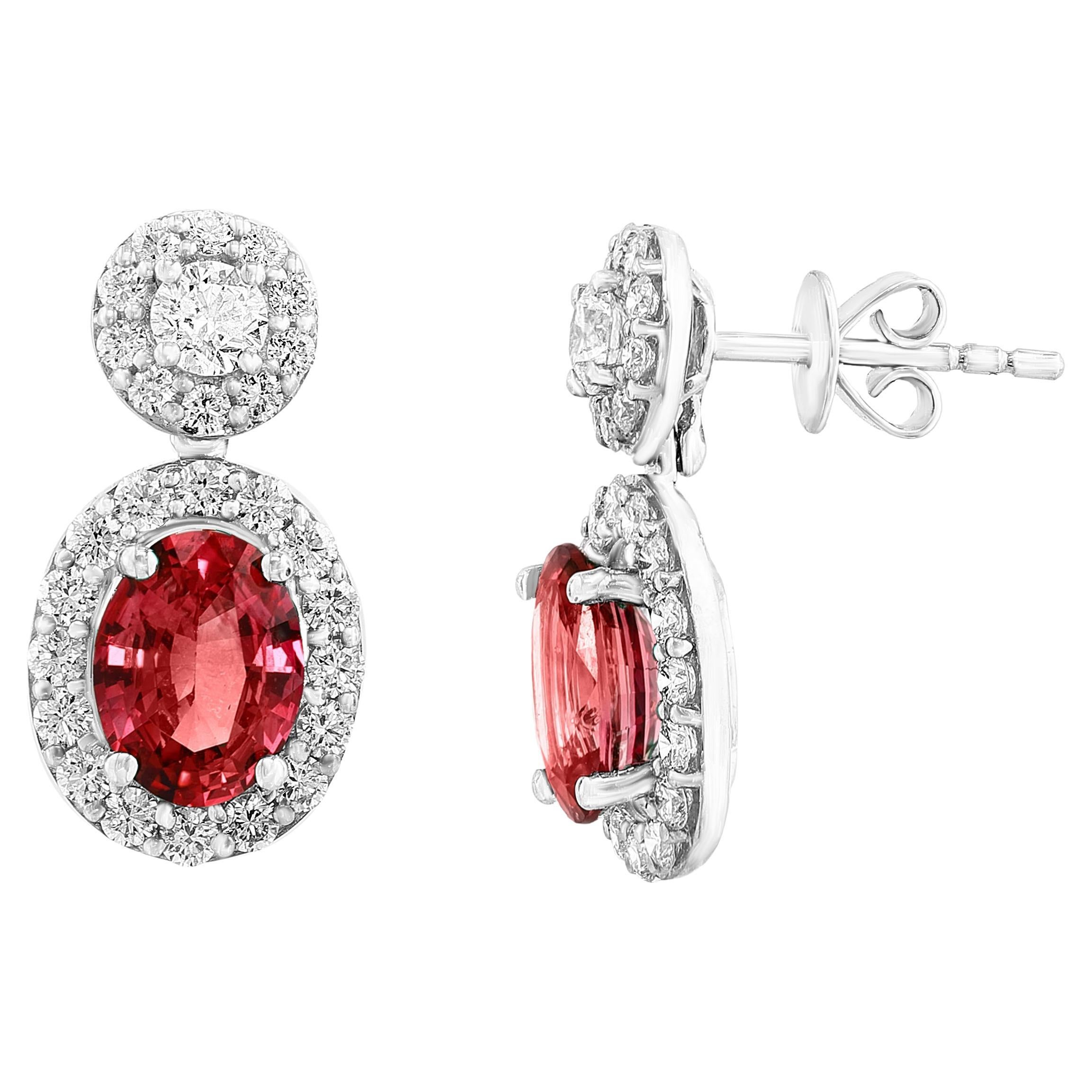 1.29 Carat of Oval Shape Ruby and Diamond Drop Earrings in 18K White Gold