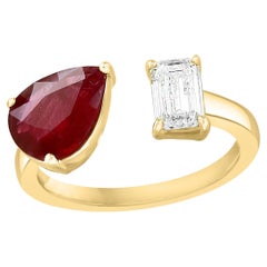 1.29 Carat Pear Shape Ruby Diamond Toi et Moi Engagement Ring in 14K Yellow Gold