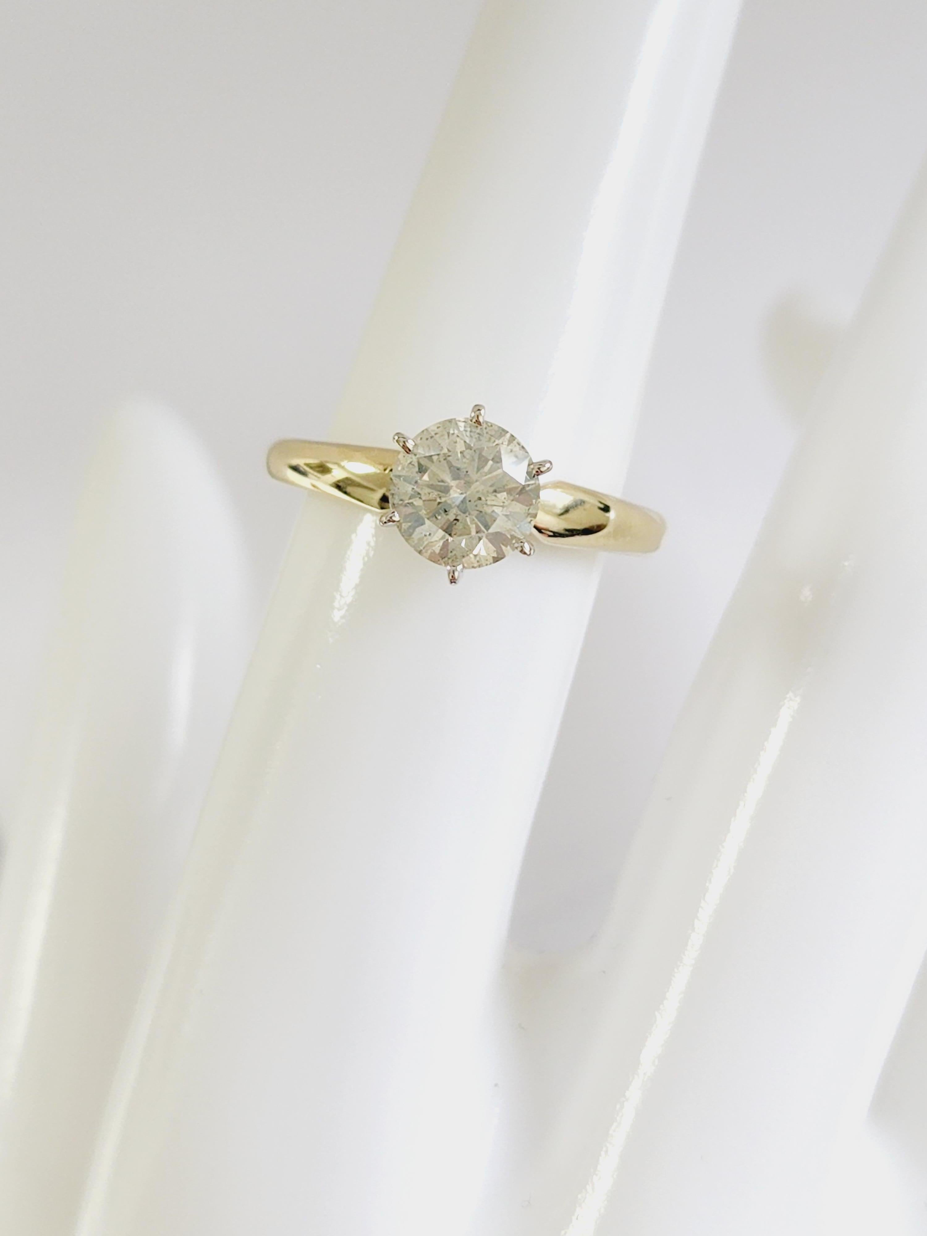 Bague solitaire en or jaune 14 carats avec diamant taille ronde de 1,29 carat certifié GIA en vente 1