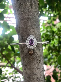 Bangle con zaffiro viola taglio goccia da 1,29 carati e diamanti in oro bianco 18 carati