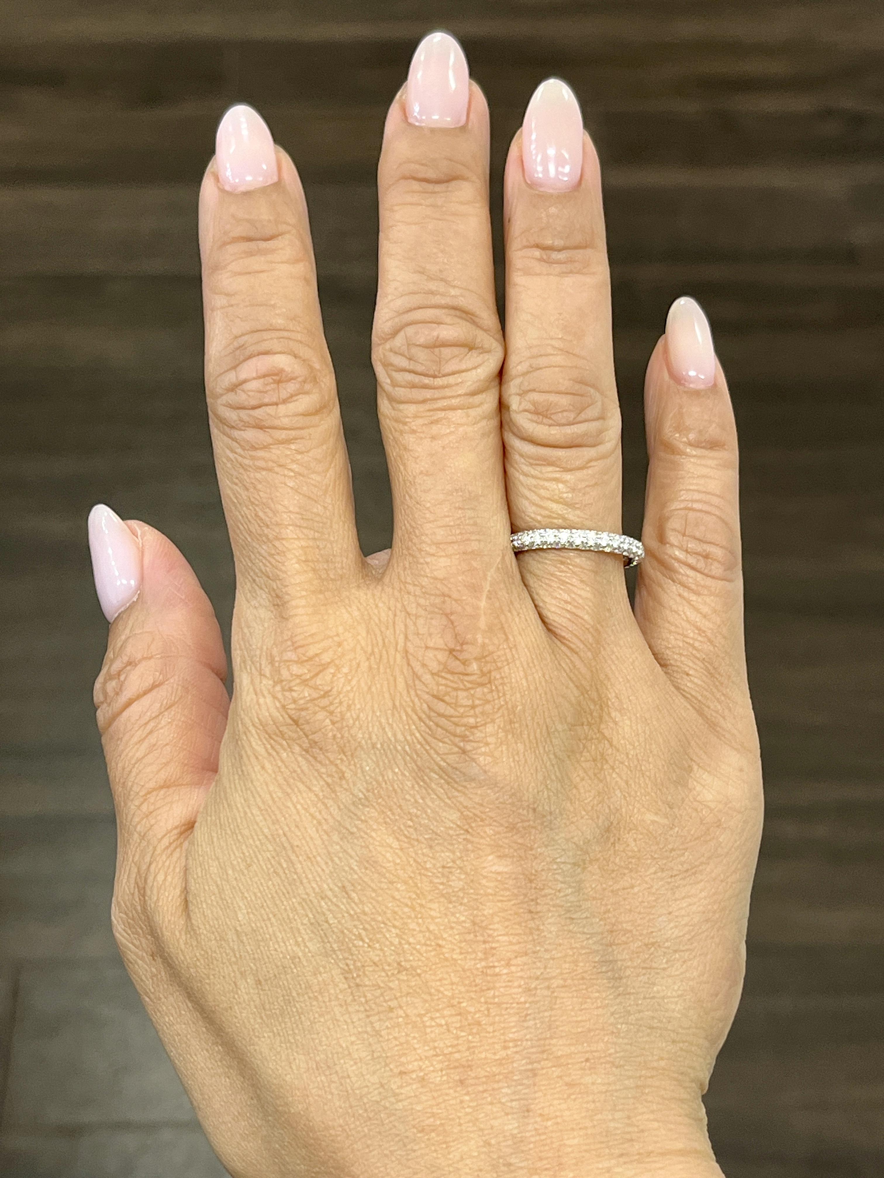 This beautiful pave eternity ring features 99 diamonds which boast a color of E/F and VS1/VS2 in color. It is such a stunning ring to add to any wardrobe!