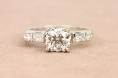 EGL Certified 1.02 Carat Round Diamond Engagement Ring with Baguette Sides