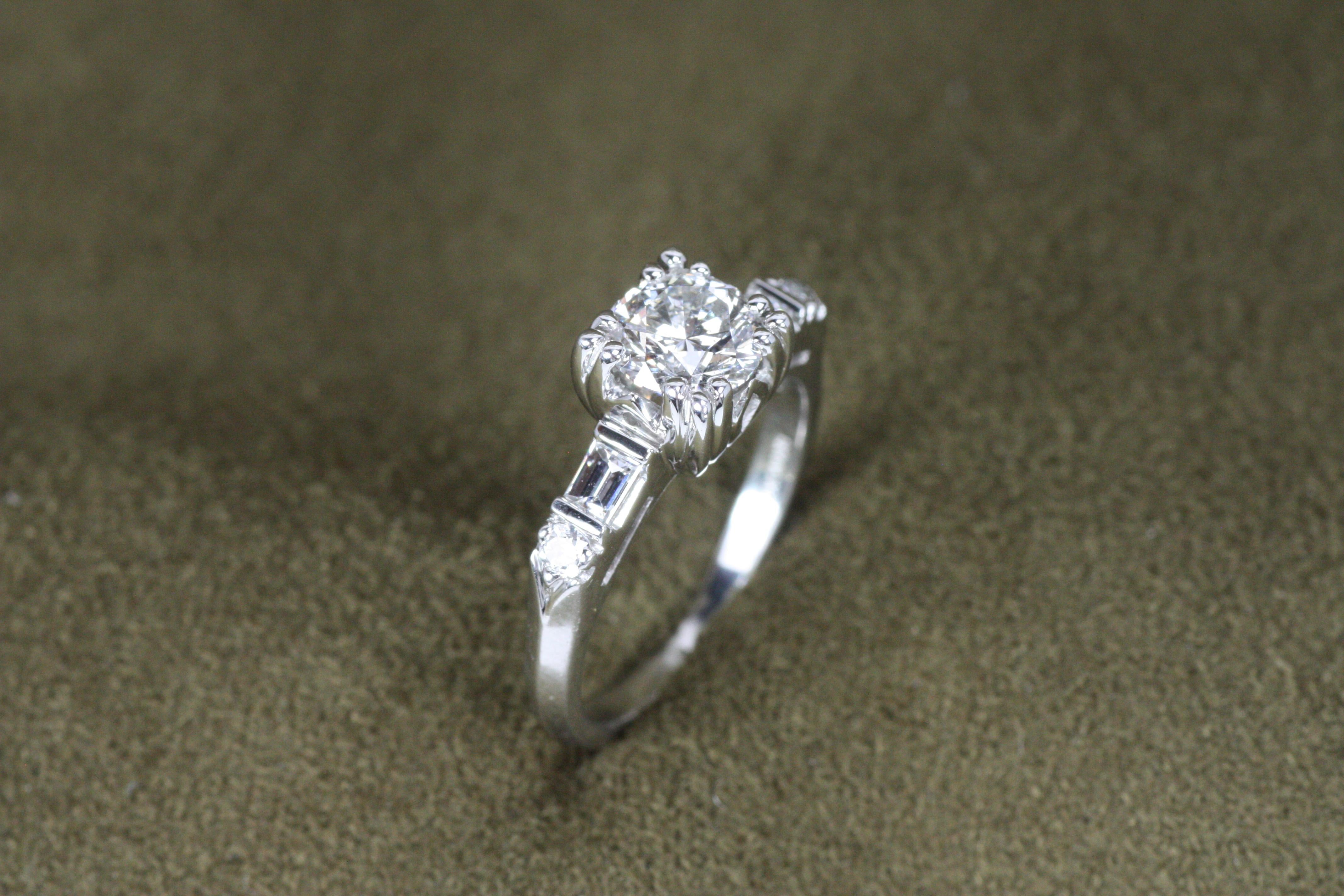 Round Cut 1.29 Total Carat Round & Baguette Diamond 1950s-Inspired Plat Engagement Ring For Sale