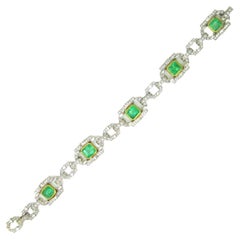Antique 12.90 Carats Deco Style Colombian Emeralds and Diamonds Links Bracelet in 18 K
