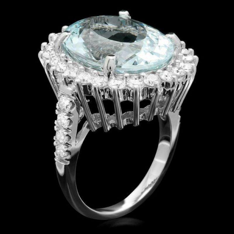 12.90 Carats Natural Aquamarine and Diamond 14K Solid White Gold Ring

Total Natural Oval Cut Aquamarine Weights: Approx. 11.40 Carats 

Aquamarine Measures: Approx. 17.00 x 13.00mm

Natural Round Diamonds Weight: Approx. 1.50 Carats (color G-H /