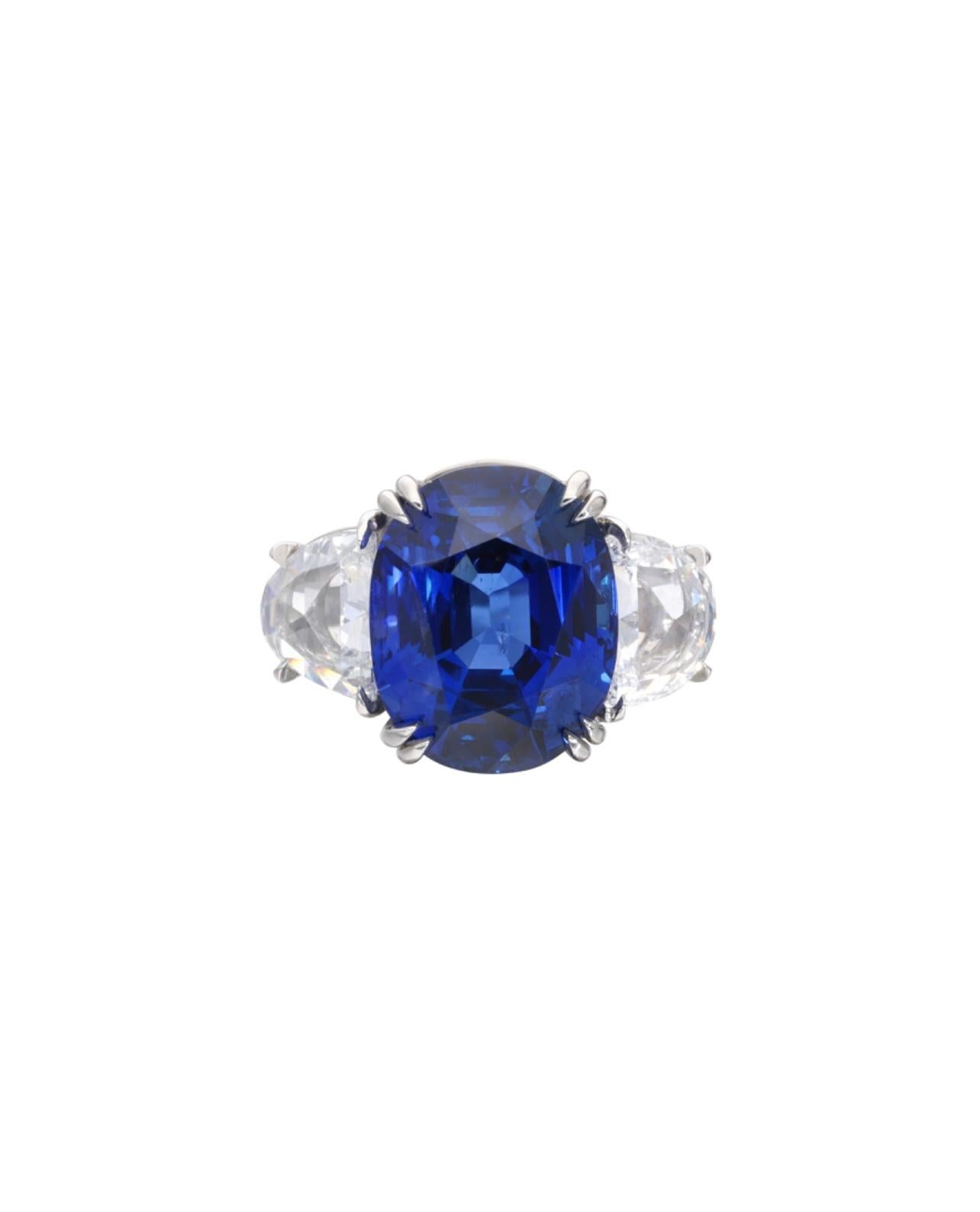 Regal and royal blue wonder. This truly gorgeous Gubelin certified 12.91 carat Burma no heat blue sapphire and diamond engagement ring is beautifully handmade in platinum. 
The details are as follows : 

Blue sapphire weight : 12.91 carat