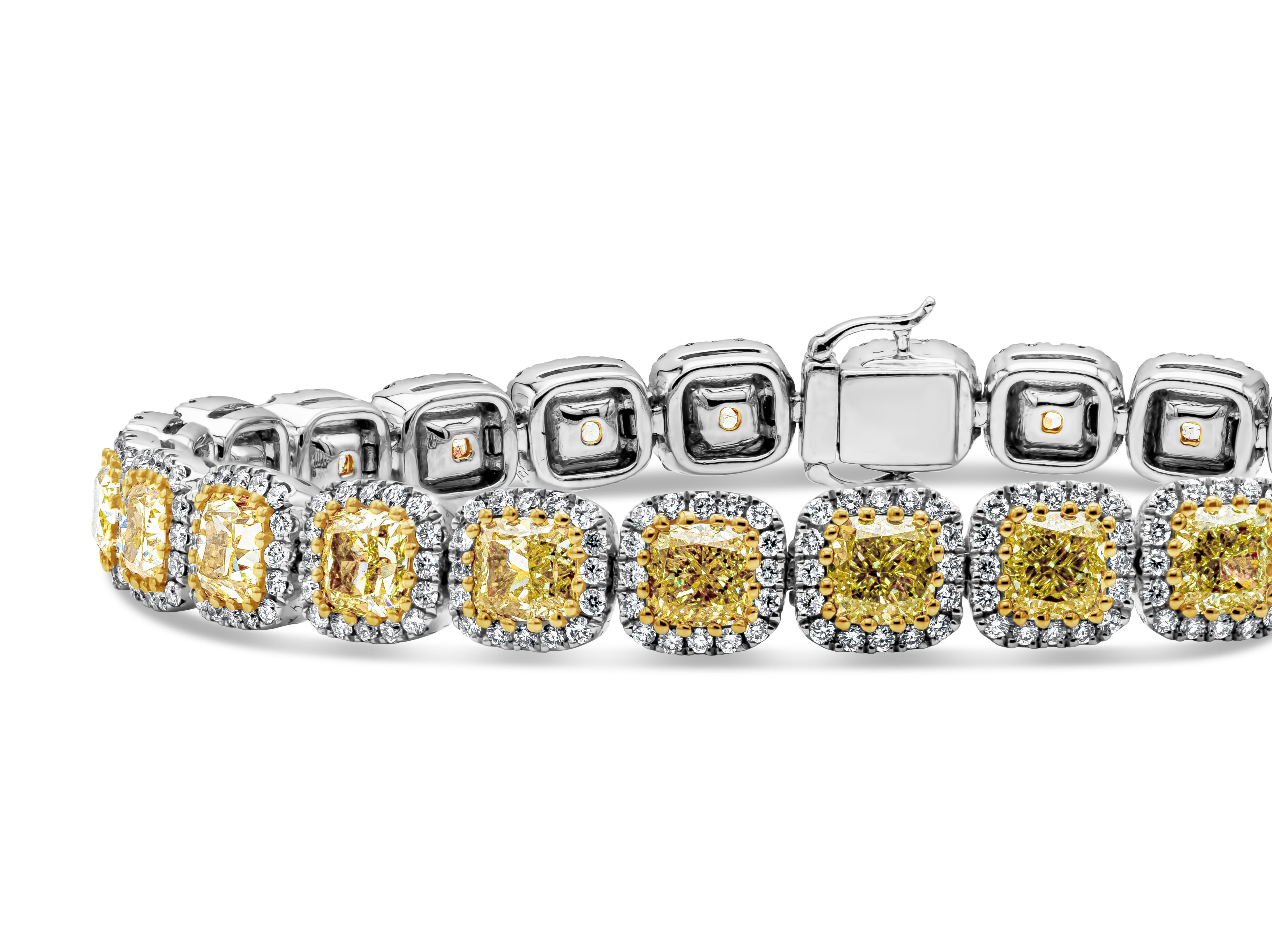 This gorgeous bracelet features 27 cushion cut fancy yellow diamonds weighing 12.92 carats total. Each stone is surrounded by a single row of brilliant round diamonds weighing 2.04 carats total.  Made with 18 karats of yellow and white gold. 

Roman