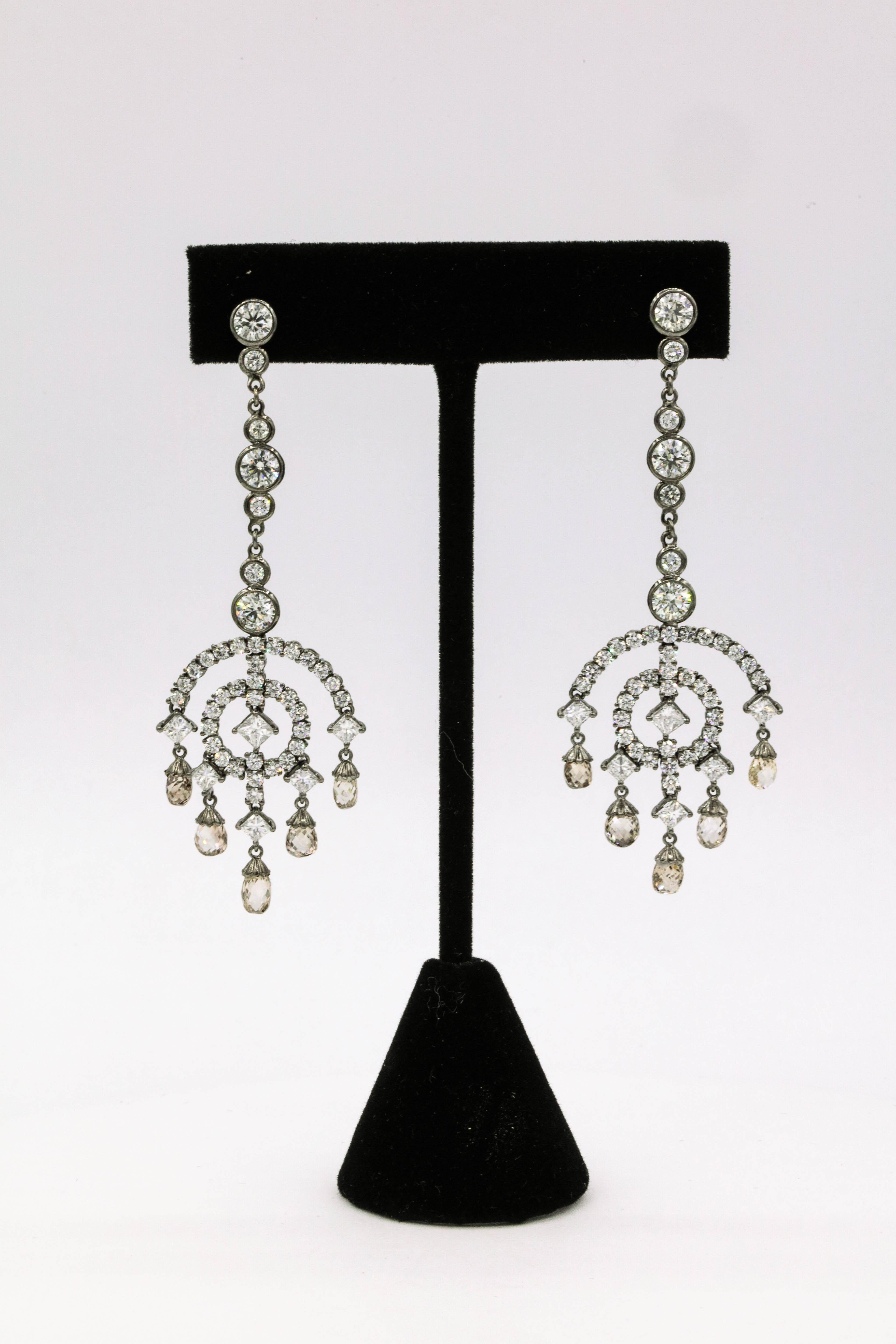 Diamond drop Art Deco motif earrings featuring 80 round brilliants 4.84 carats, 10 princess cut diamonds, 2.17 carats and 10 briolette diamonds, 5.92 carats, in 14k black rhodium. 
Color: G-H
Clarity: SI