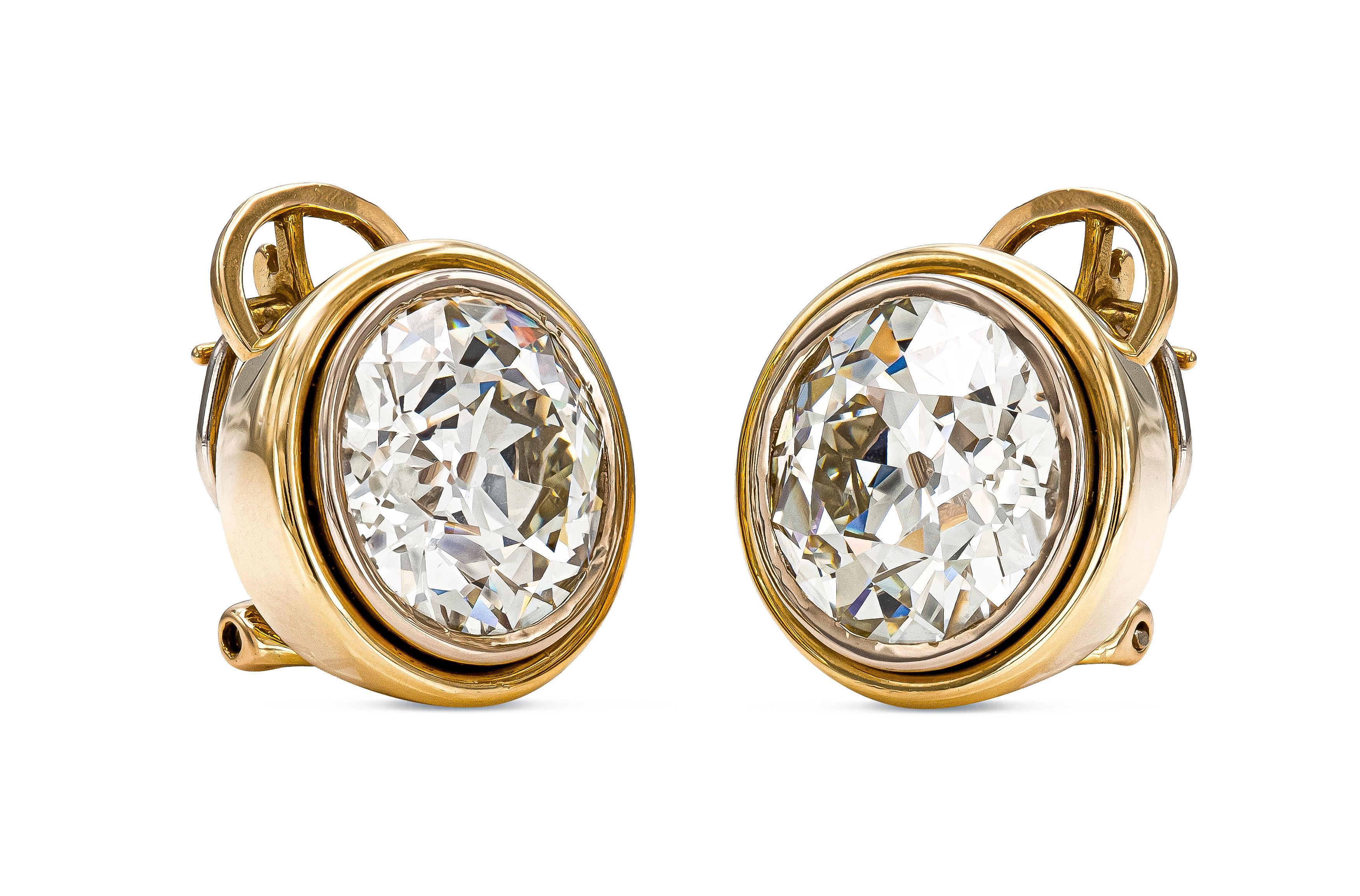 Finely crafted in 18k yellow gold with 2 bezel set, GIA certified Old European cut Diamonds.
One Diamond weighs 6.62 carats, L color, VS1 clarity, GIA #2235021783.
The other Diamond weighs 6.32 carats, L color, VS2 clarity, GIA #2235021752.