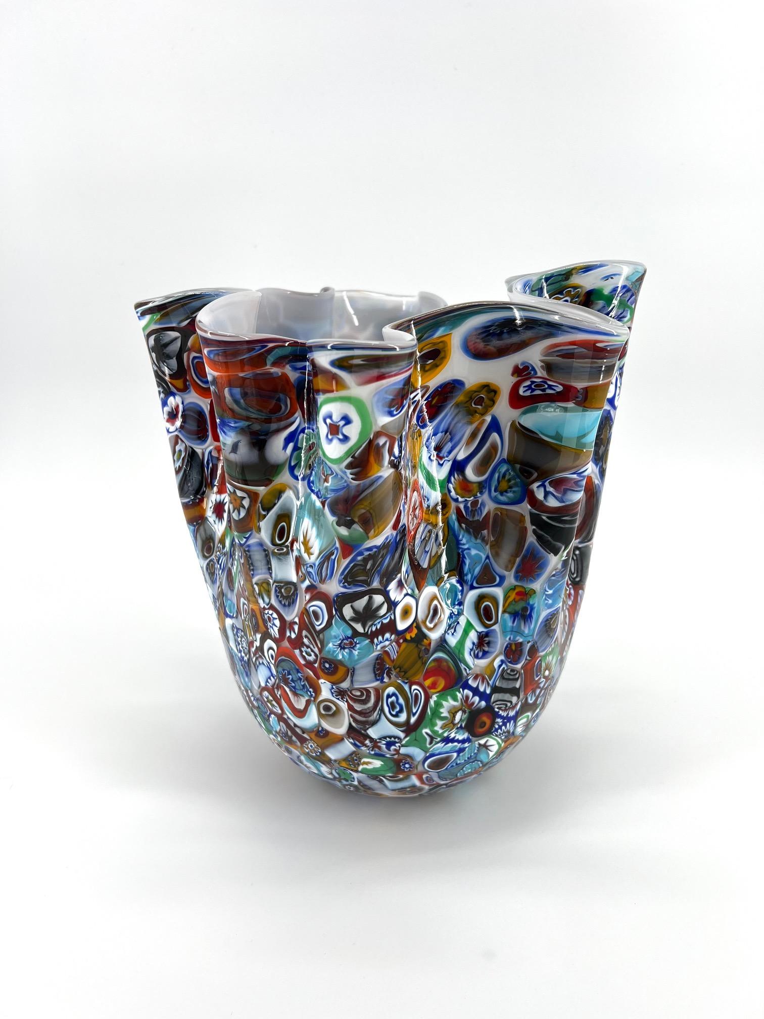 Our aim is the emotion through the creation of Murano glass artpieces.
 
This art-vase is made of inner 