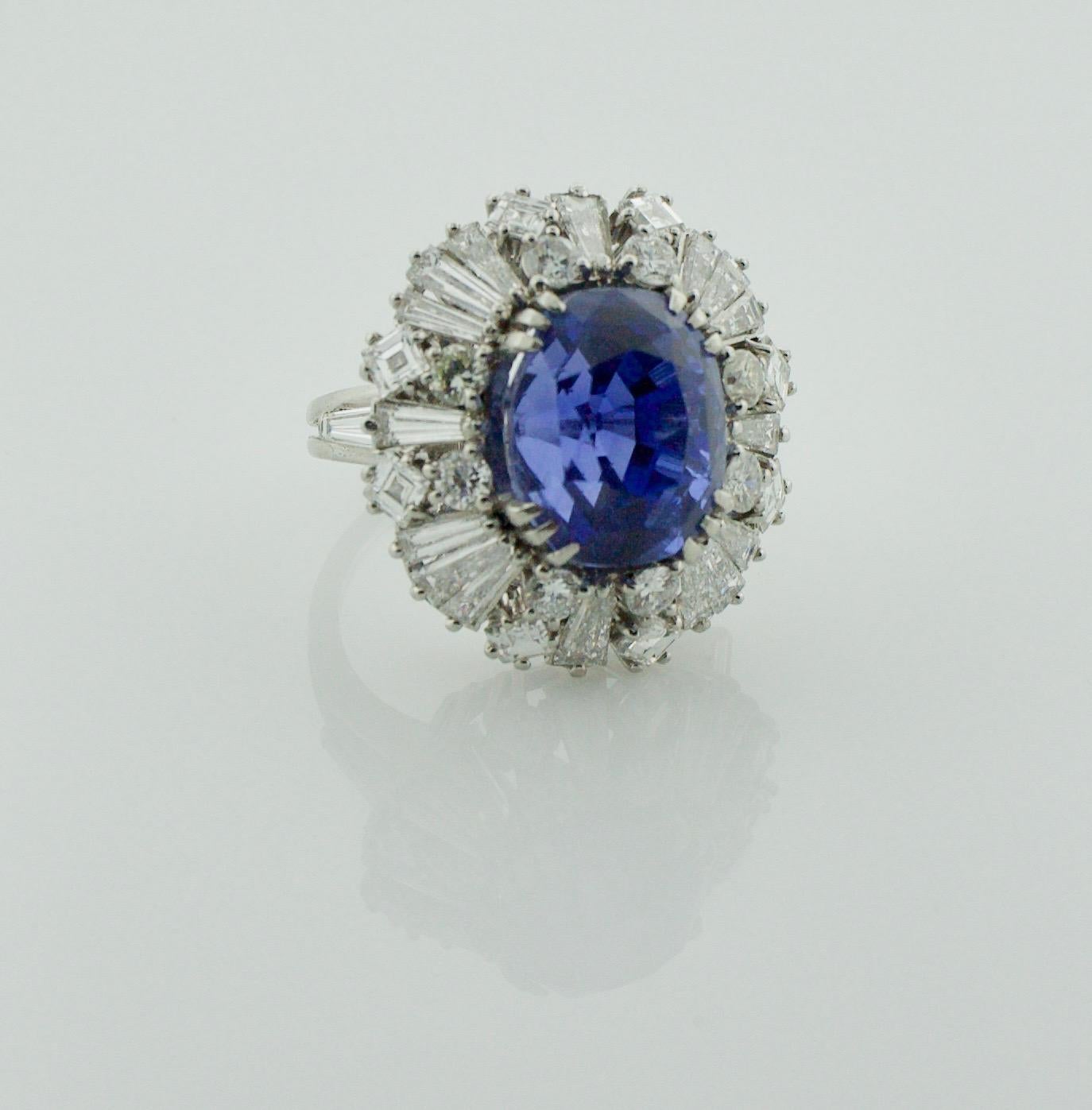 12.96 No Heat Ceylon Important Sapphire and Diamond 1950's Ring in Platinum  
size 5- 1/4.  We will size to fit at no cost to buyer.
A Extreamly Vibrant 12.96 Sapphire in its original 1950's Setting
Thirty Four Round Brilliant Tapered Baguette and