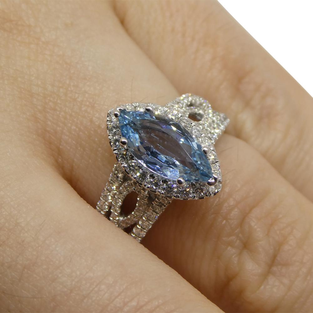 
Introducing our captivating Marquise-Cut Aquamarine and Diamond Ring, a graceful fusion of elegance and sophistication. At the core of this exquisite piece lies a stunning marquise-cut aquamarine, weighing 1.29 carats. This aquamarine, renowned for