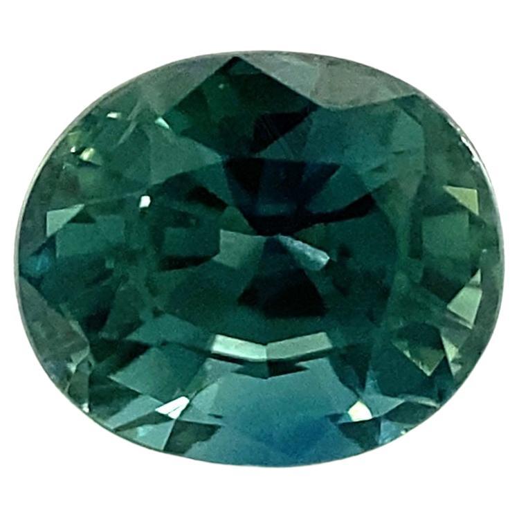 Fine Vivid Green Blue Teal Sapphire Gemstone.

1.29 Carat with a beautiful vivid green blue teal colour and very good clarity, a clean stone.

Also has an excellent oval cut and polish to show great shine and colour, would look lovely in jewellery.